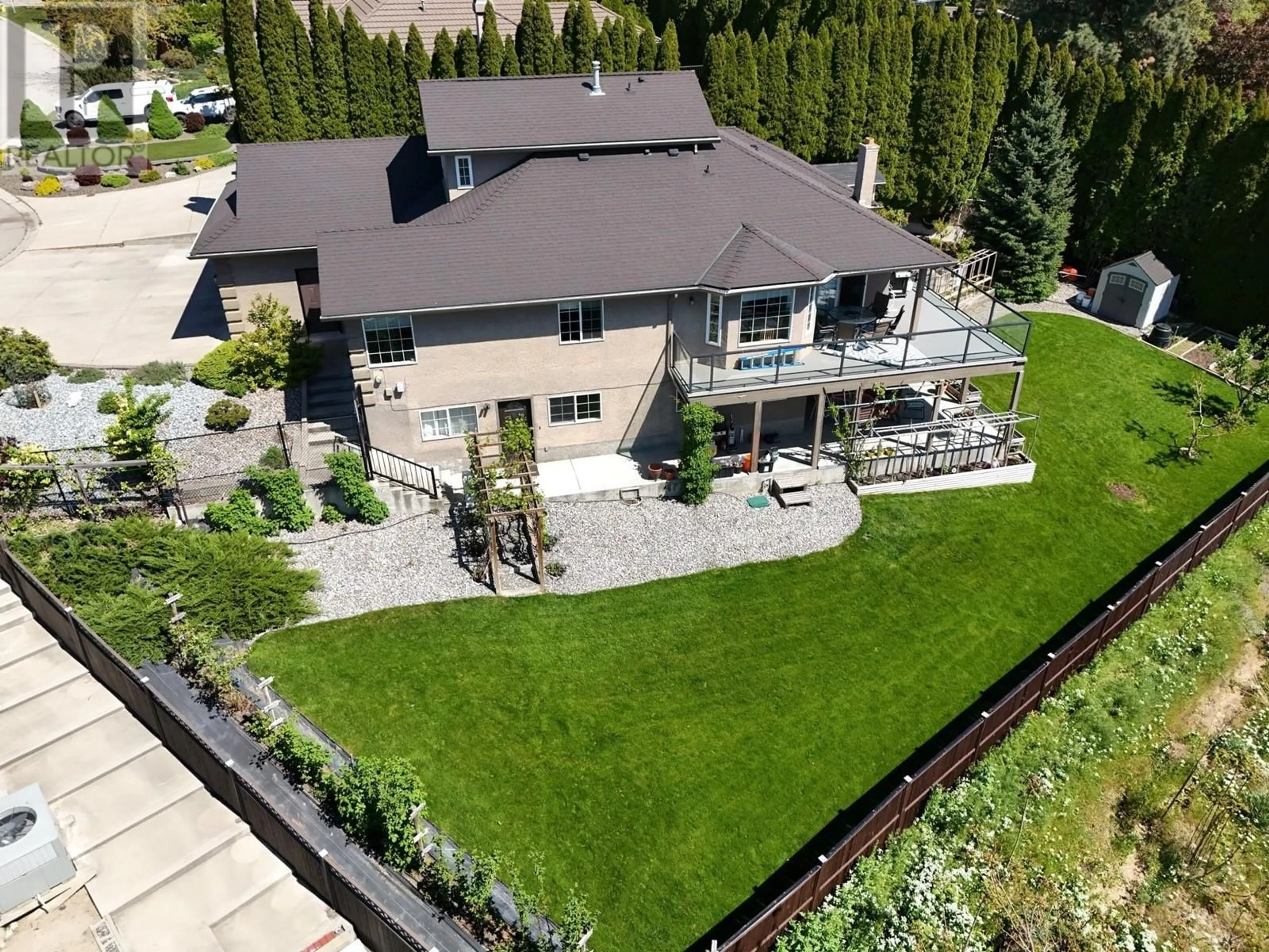 A pic from outside/outdoor area/front of a property/back of a property/a pic from drone, unknown for 1065 WALDIE COURT, Kelowna British Columbia V1Y9P8