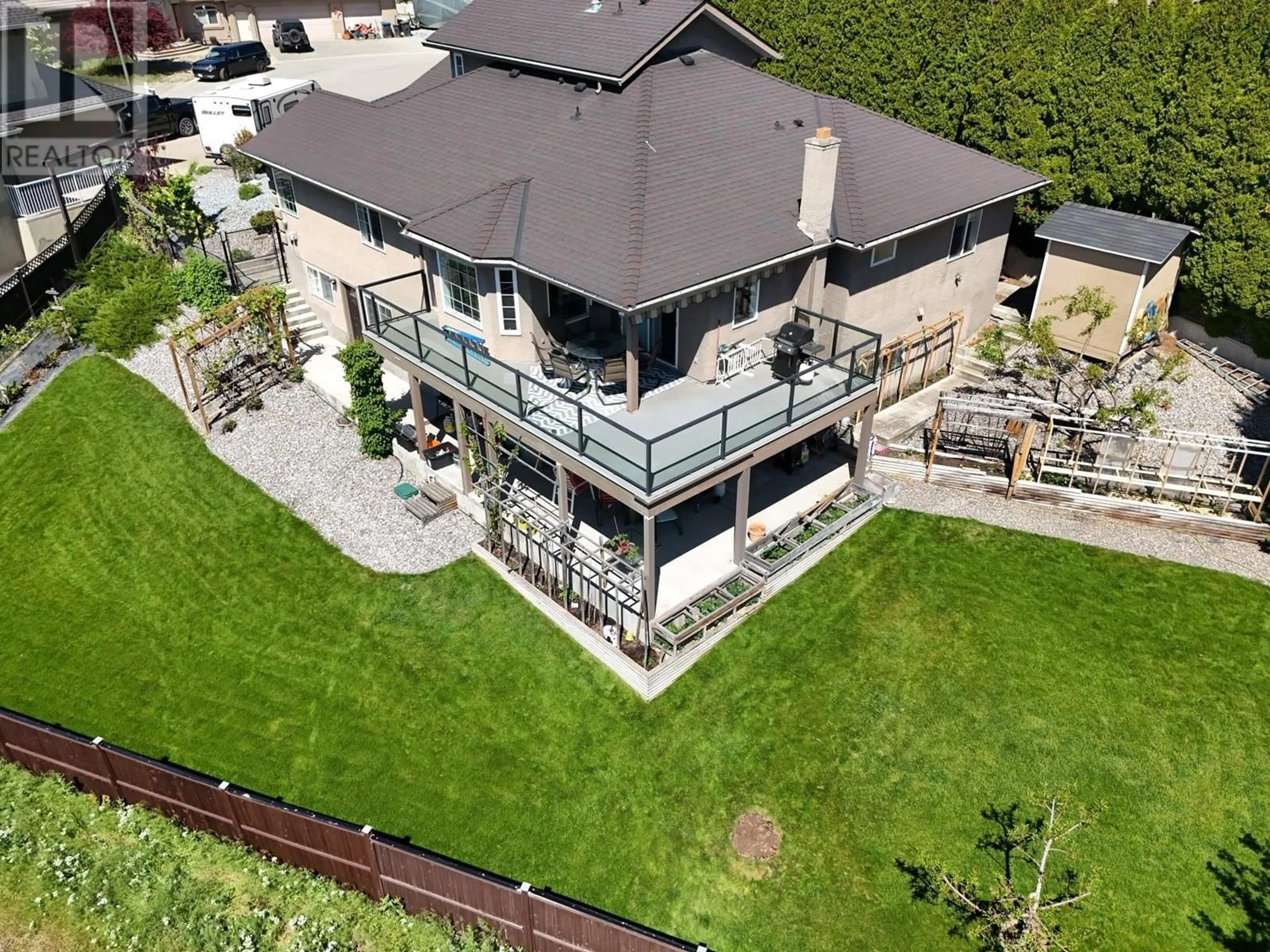 A pic from outside/outdoor area/front of a property/back of a property/a pic from drone, unknown for 1065 WALDIE COURT, Kelowna British Columbia V1Y9P8