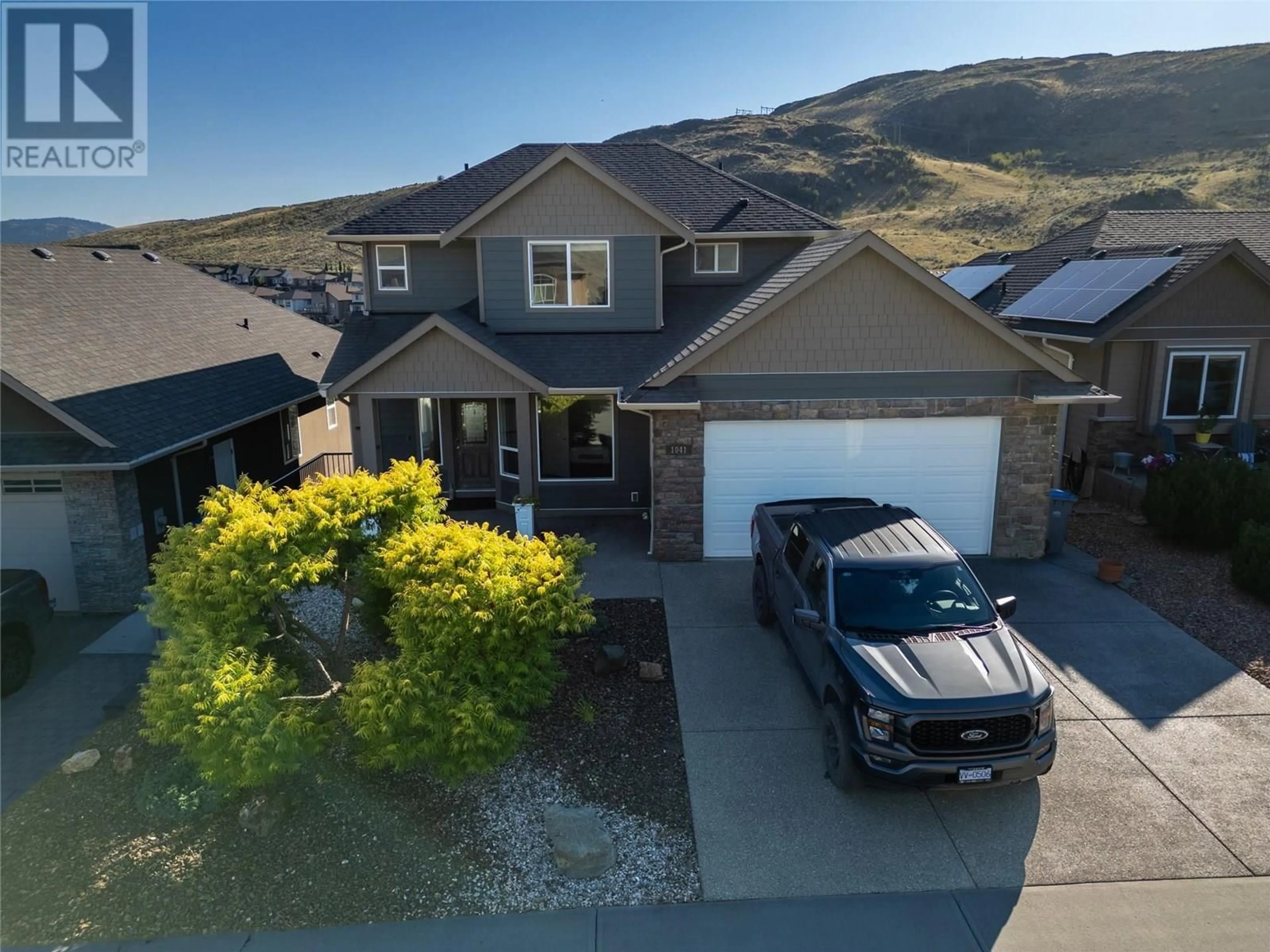A pic from outside/outdoor area/front of a property/back of a property/a pic from drone, mountain view for 1041 SADDLEBACK COURT, Kamloops British Columbia V2B0B9