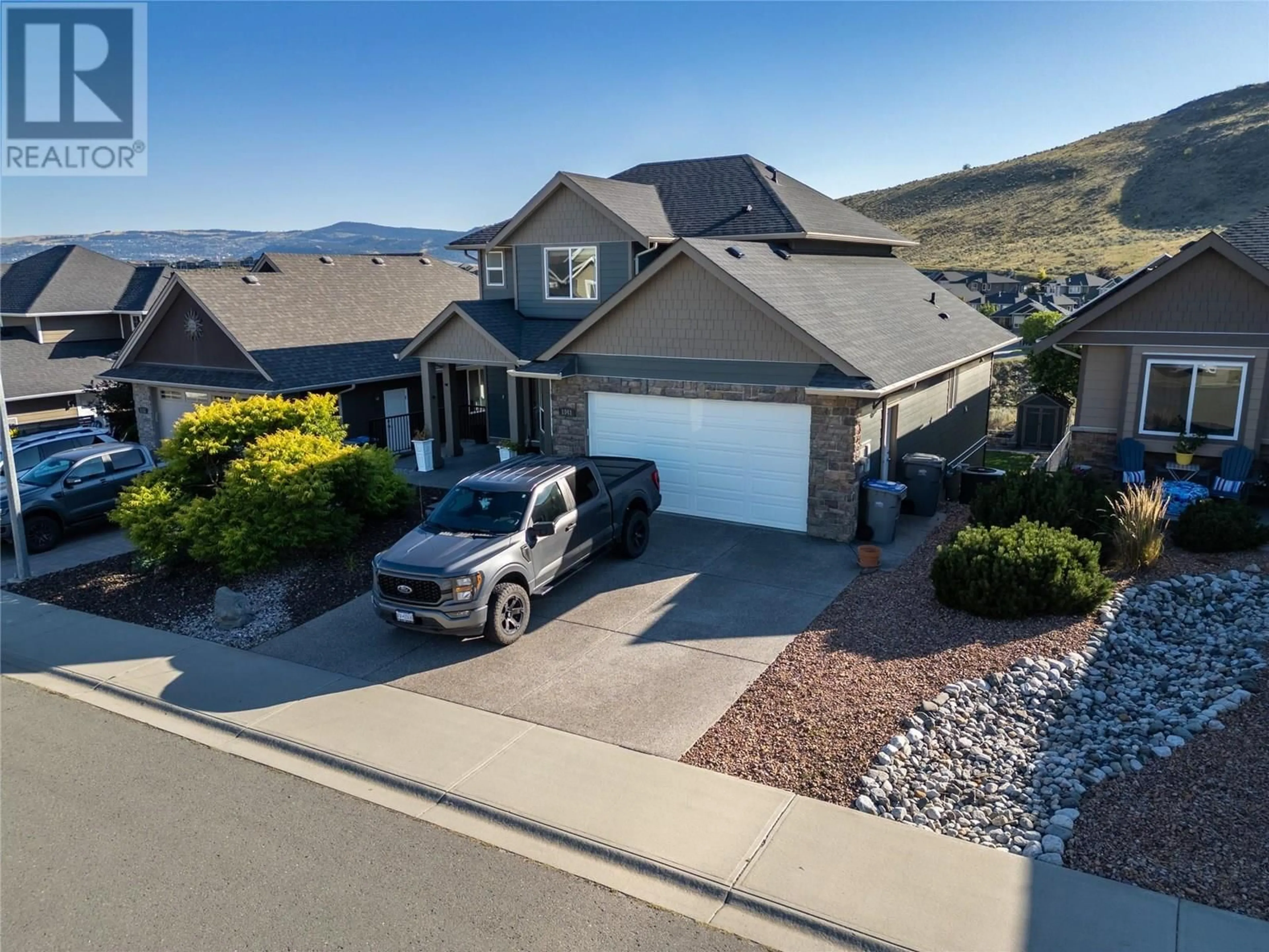 A pic from outside/outdoor area/front of a property/back of a property/a pic from drone, mountain view for 1041 SADDLEBACK COURT, Kamloops British Columbia V2B0B9
