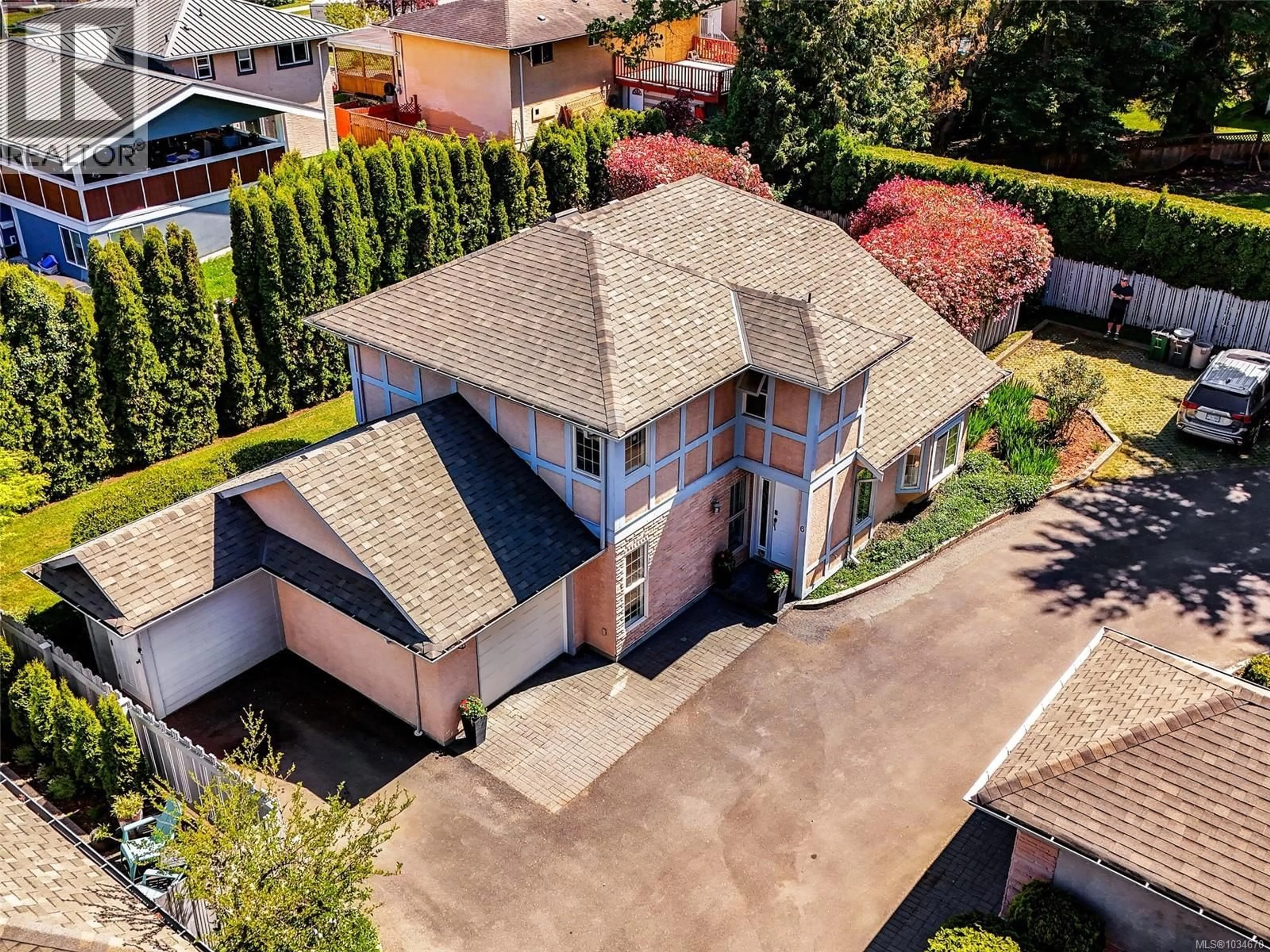 A pic from outside/outdoor area/front of a property/back of a property/a pic from drone, street for 6 - 1809 MCKENZIE AVENUE, Saanich British Columbia V8N1A6
