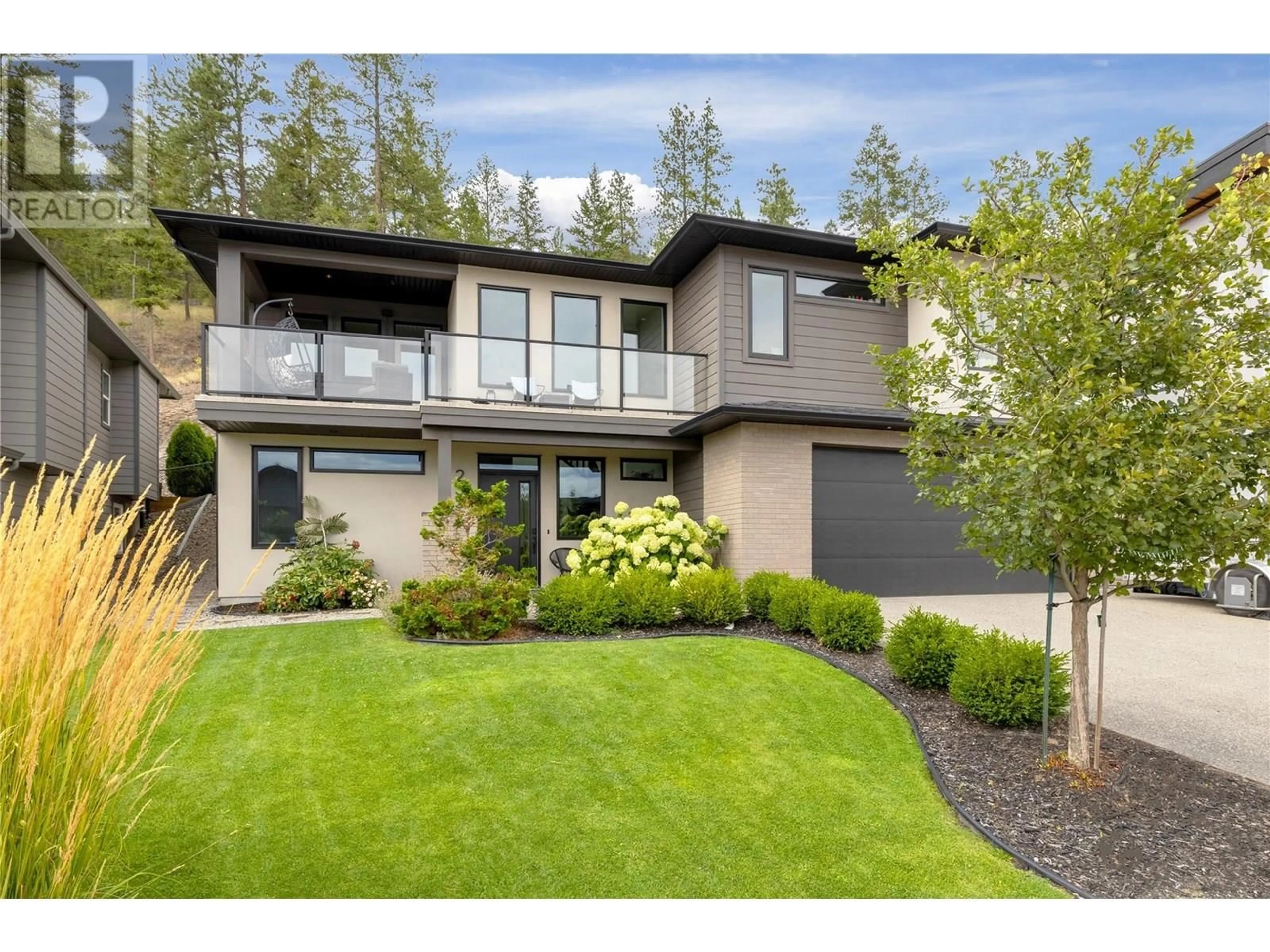 Home with vinyl exterior material, street for 2558 CROWN CREST DRIVE, West Kelowna British Columbia V4T3M6