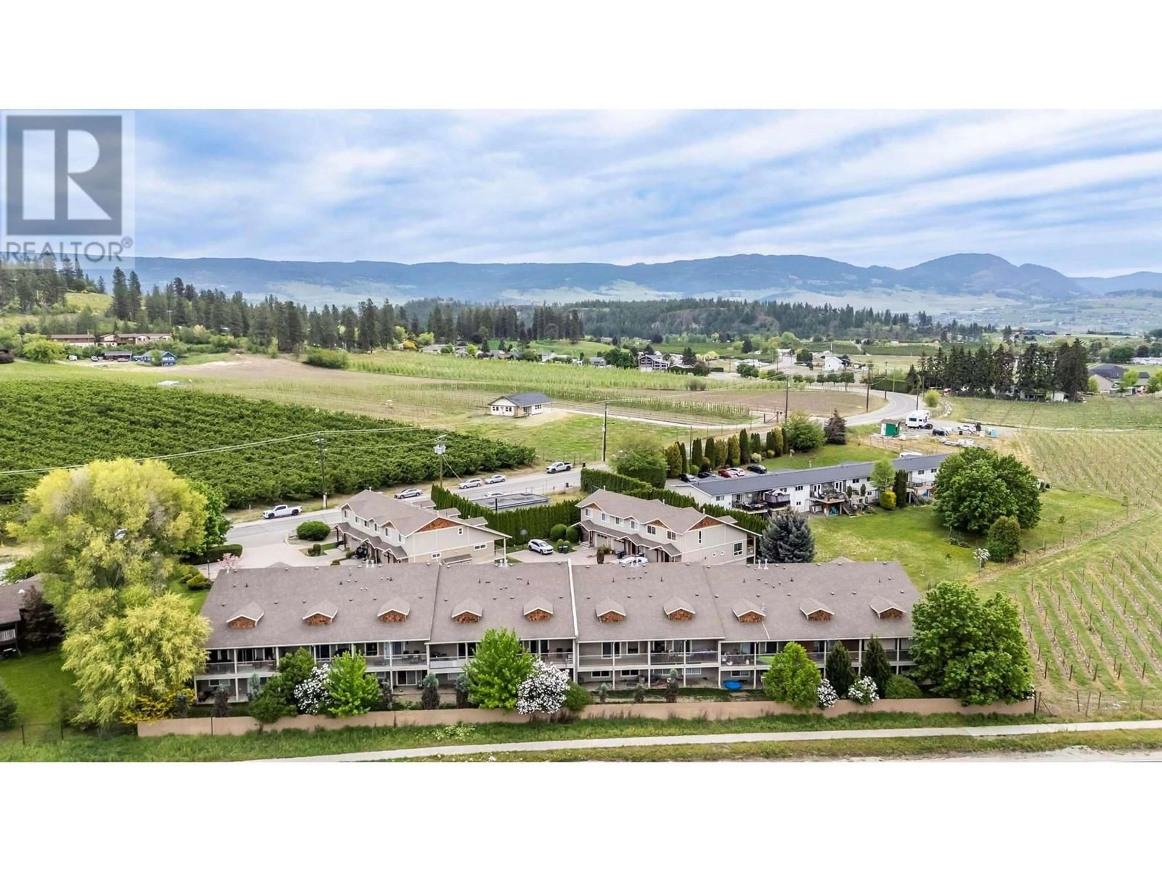 A pic from outside/outdoor area/front of a property/back of a property/a pic from drone, mountain view for 8 - 2131 SCENIC ROAD, Kelowna British Columbia V1V2T5
