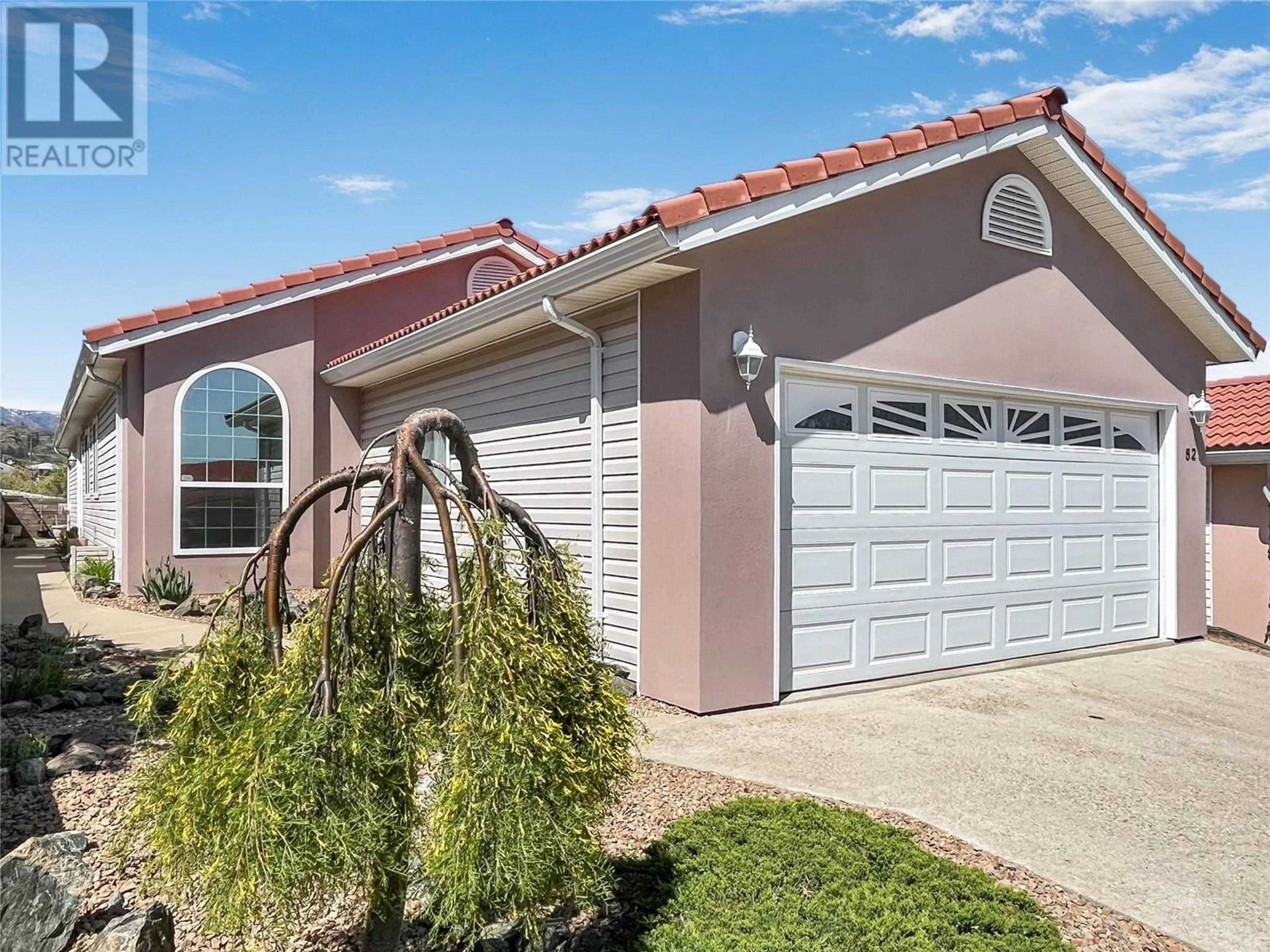 Home with vinyl exterior material, street for 52 9400 115TH STREET, Osoyoos British Columbia V0H1V5