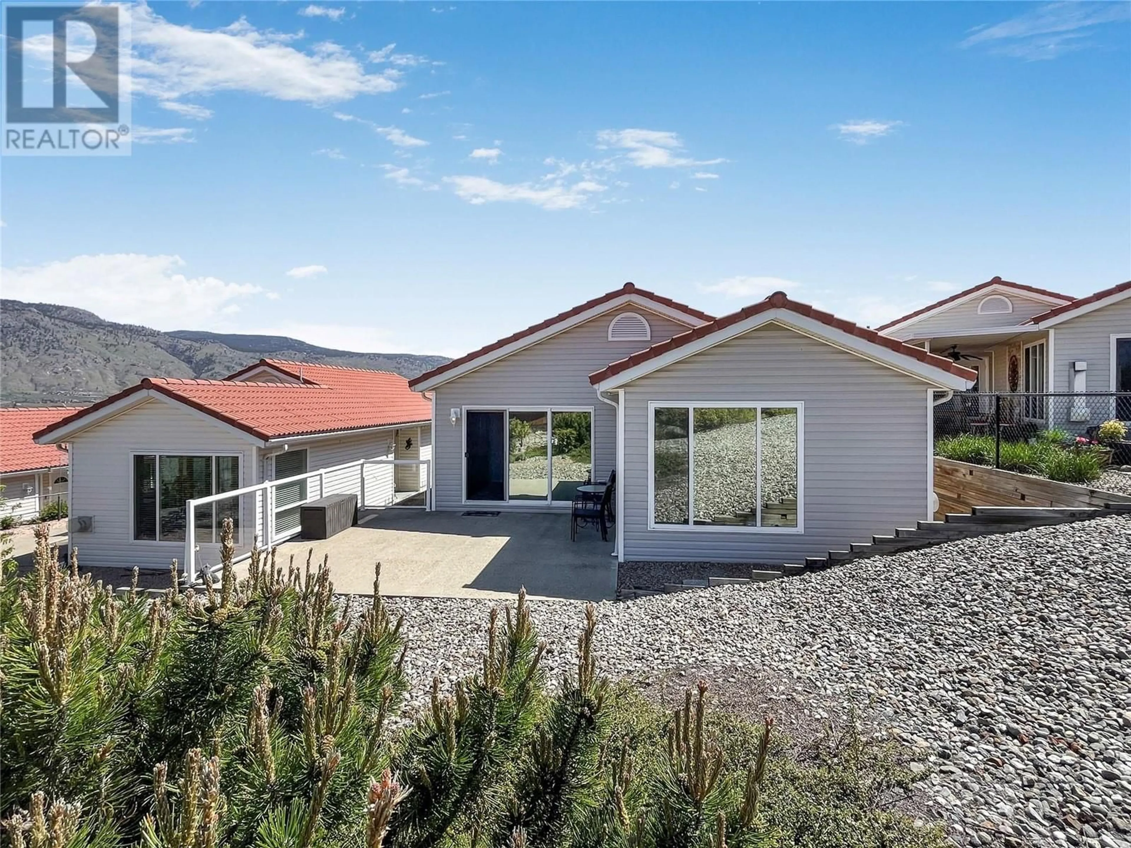 Home with vinyl exterior material, mountain view for 52 - 9400 115TH STREET, Osoyoos British Columbia V0H1V5