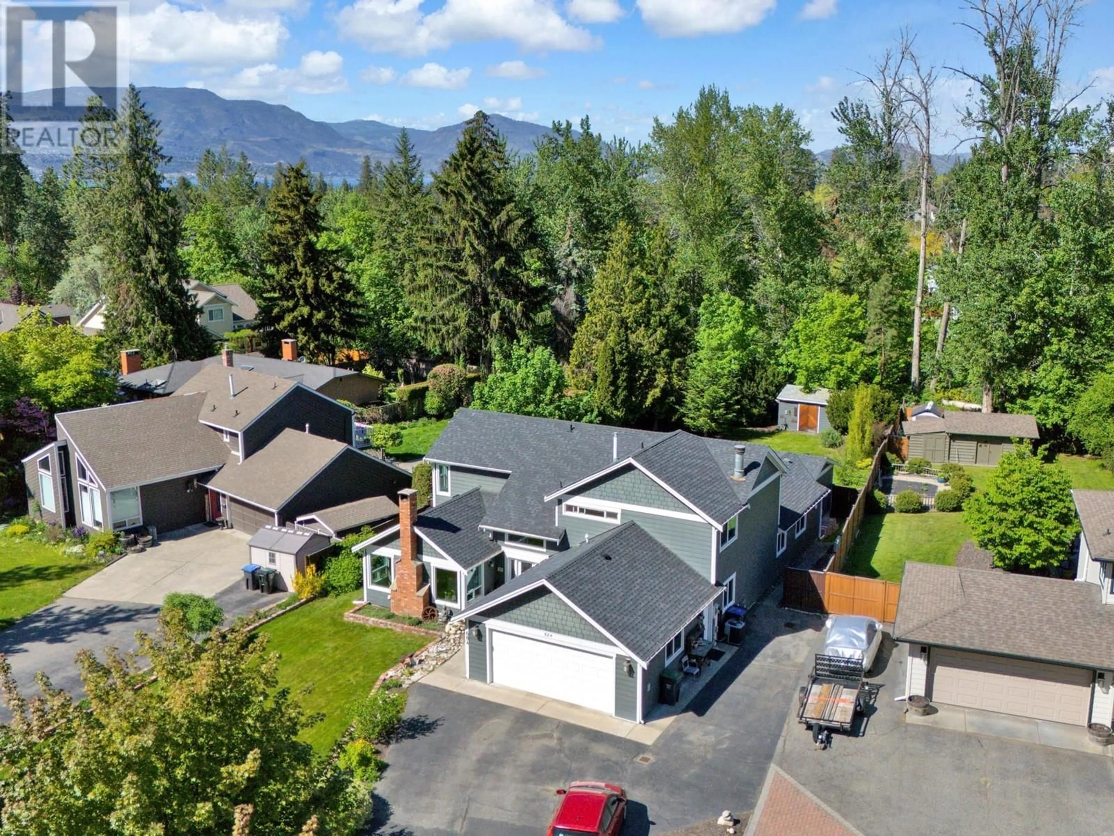 A pic from outside/outdoor area/front of a property/back of a property/a pic from drone, mountain view for 684 THORNELOE ROAD, Kelowna British Columbia V1W4P6