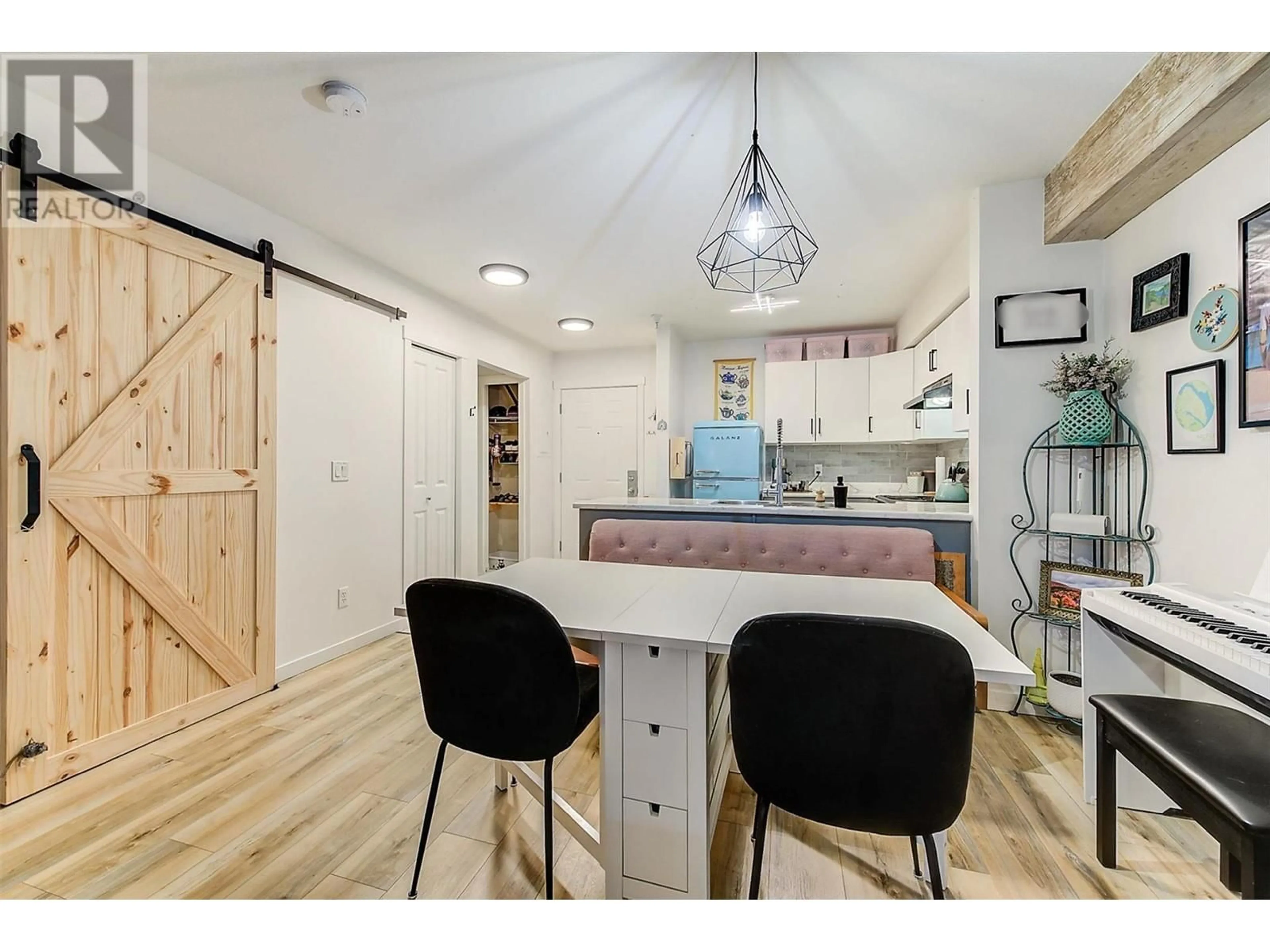 Open concept kitchen, unknown for 210 - 1481 GLENMORE ROAD NORTH, Kelowna British Columbia V1V2C5