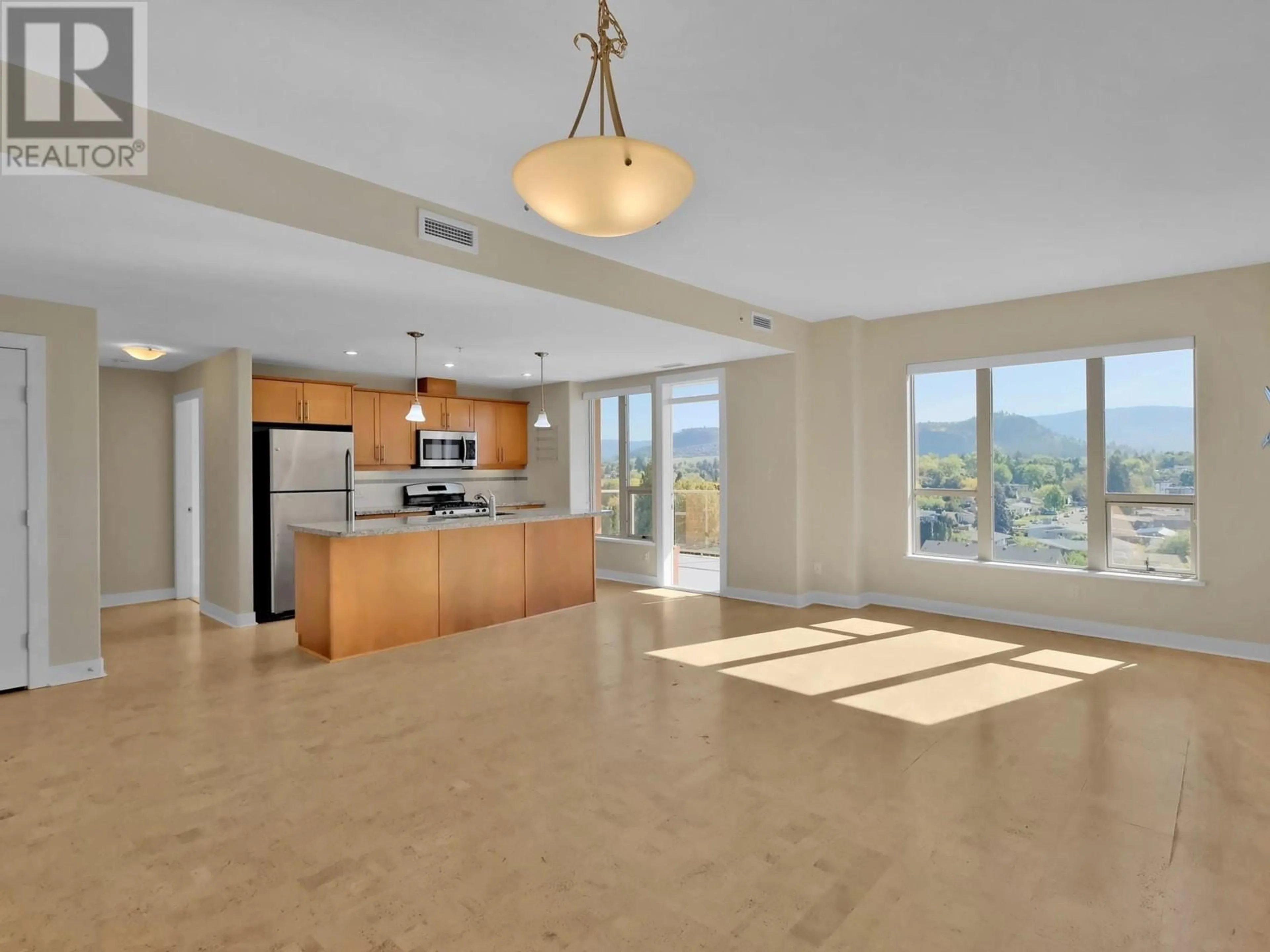 Open concept kitchen, ceramic/tile floor for 604 - 1160 BERNARD AVENUE, Kelowna British Columbia V1Y6R9