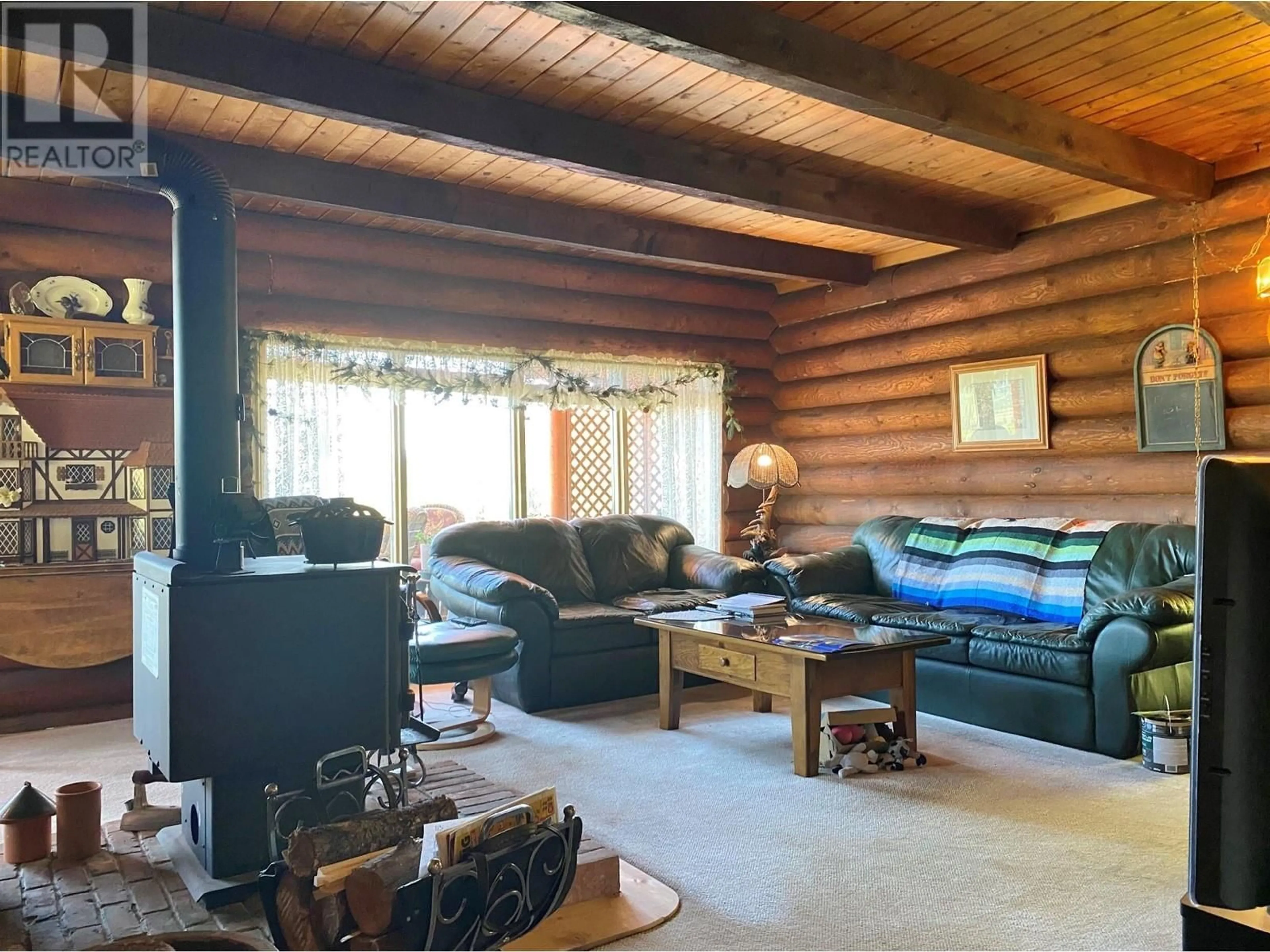 Living room with furniture, wood/laminate floor for 3975 HARDY MOUNTAIN ROAD, Grand Forks British Columbia V0A1H2