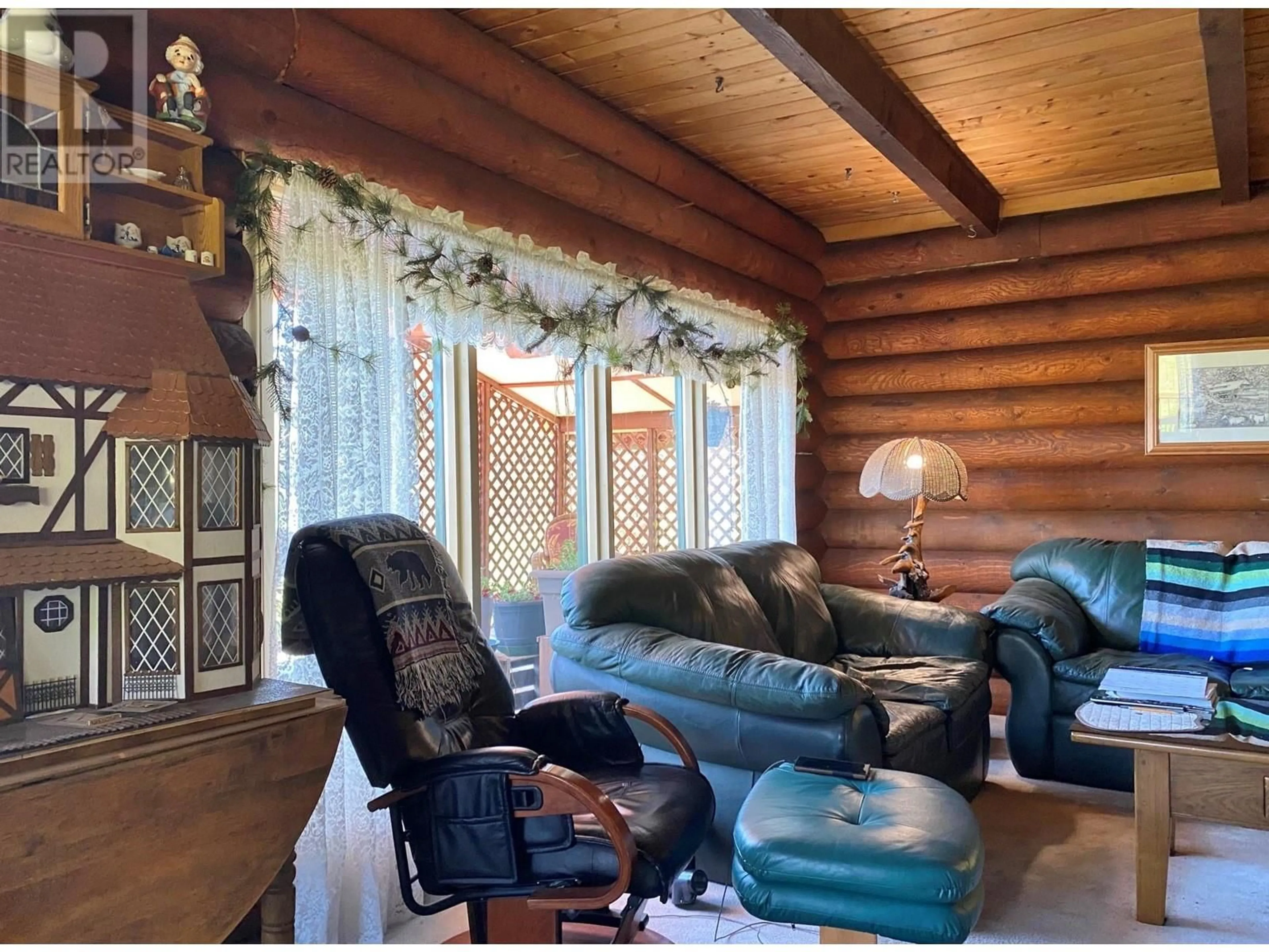 Living room with furniture, wood/laminate floor for 3975 HARDY MOUNTAIN ROAD, Grand Forks British Columbia V0A1H2