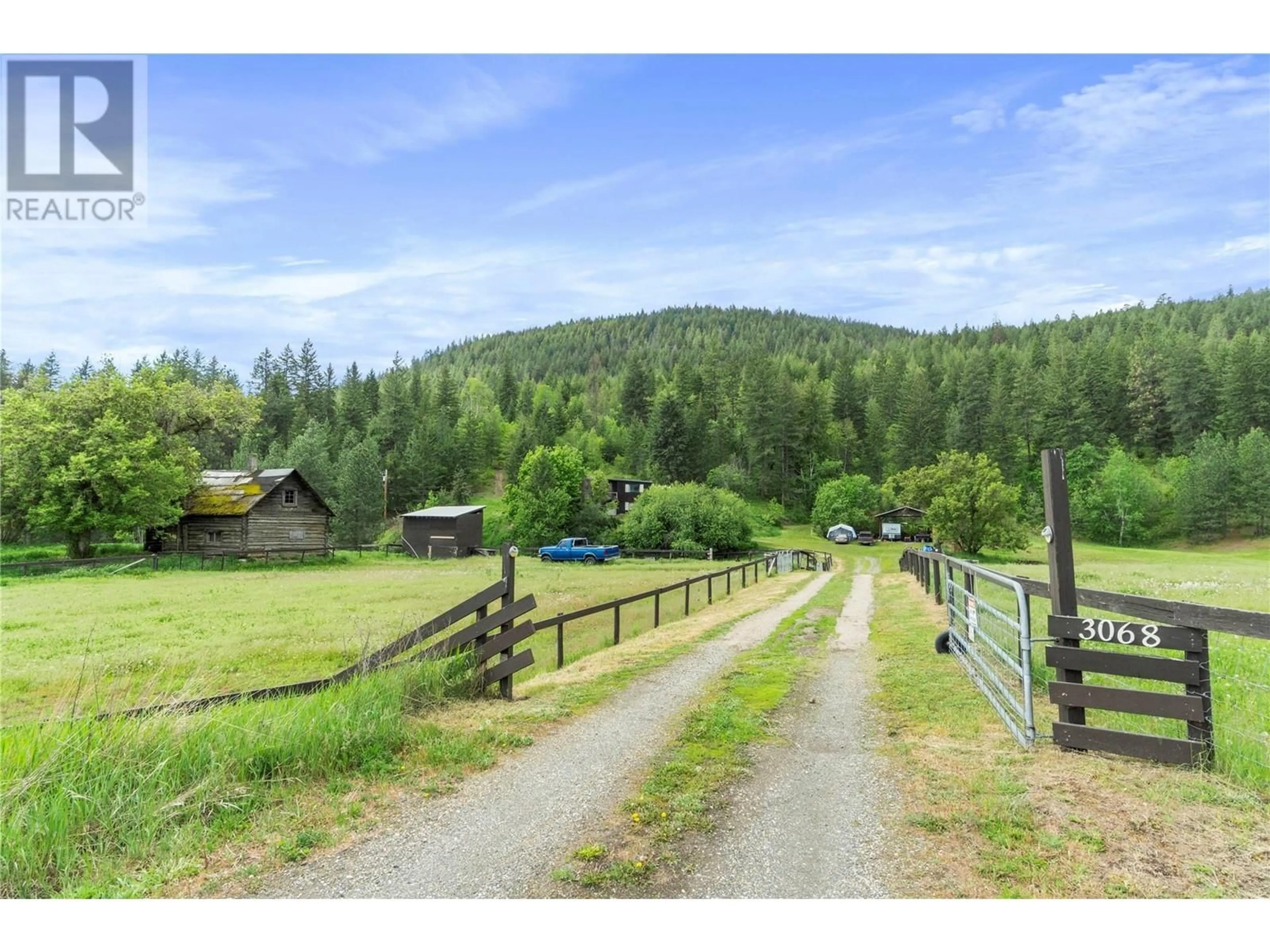 A pic from outside/outdoor area/front of a property/back of a property/a pic from drone, mountain view for 3068 YANKEE FLATS ROAD, Salmon Arm British Columbia V1E3K6