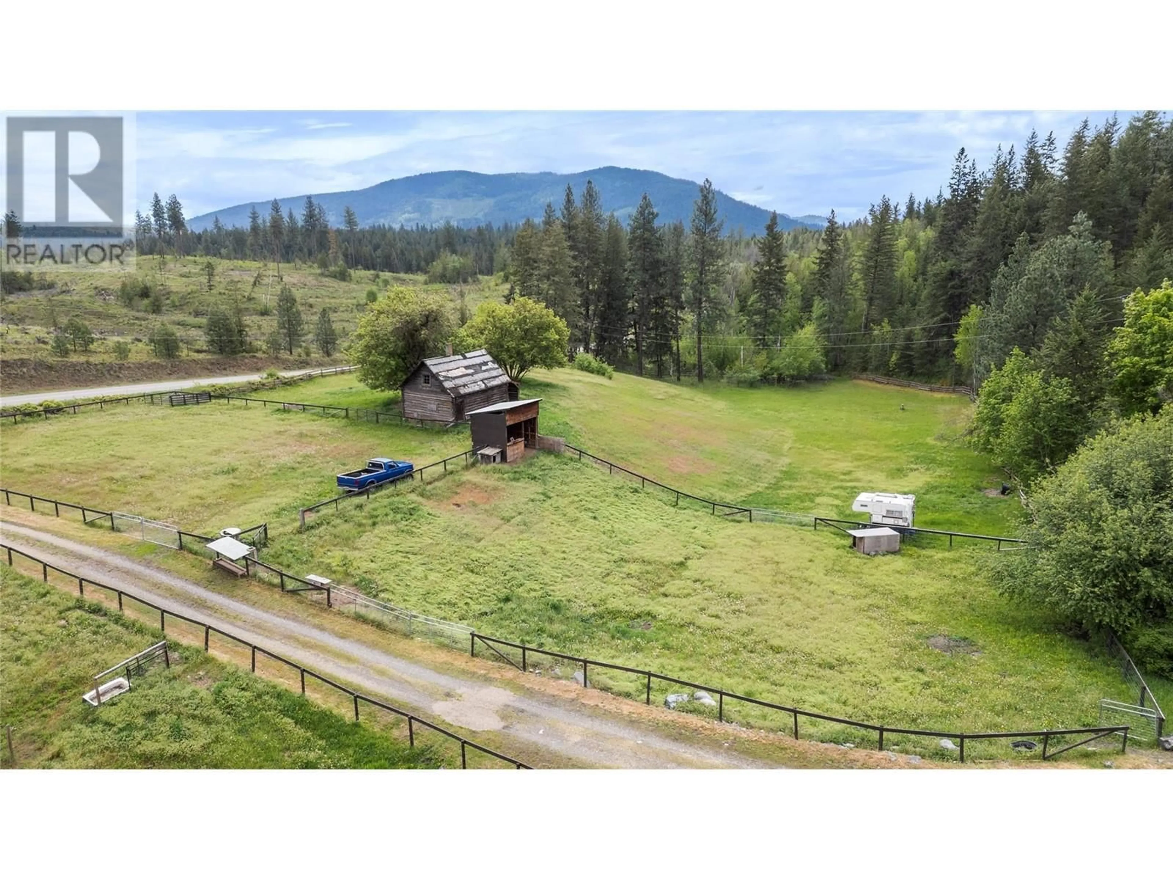 A pic from outside/outdoor area/front of a property/back of a property/a pic from drone, mountain view for 3068 YANKEE FLATS ROAD, Salmon Arm British Columbia V1E3K6
