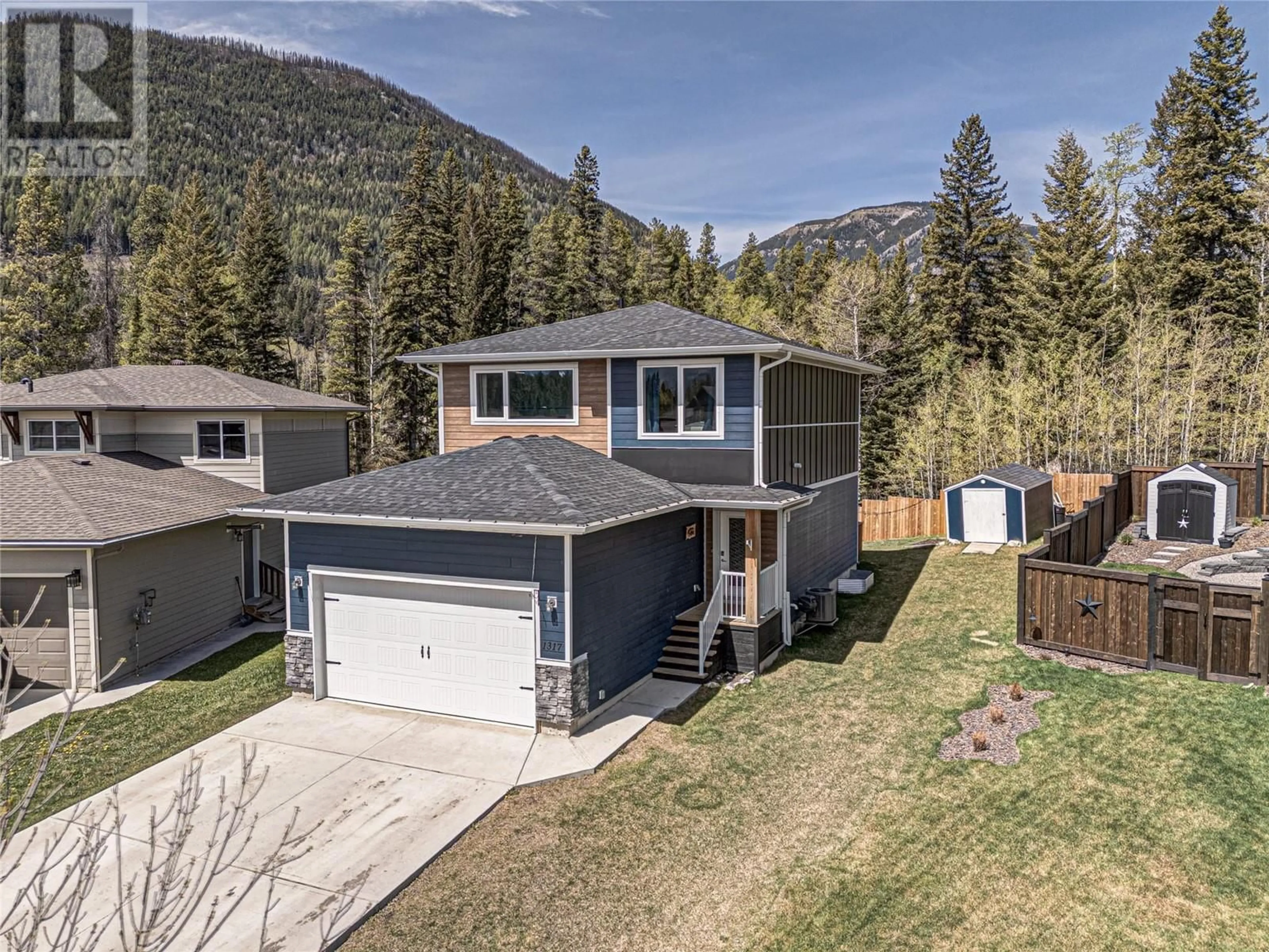 A pic from outside/outdoor area/front of a property/back of a property/a pic from drone, mountain view for 1317 CHERRYWOOD BOULEVARD, Sparwood British Columbia V0B2G2