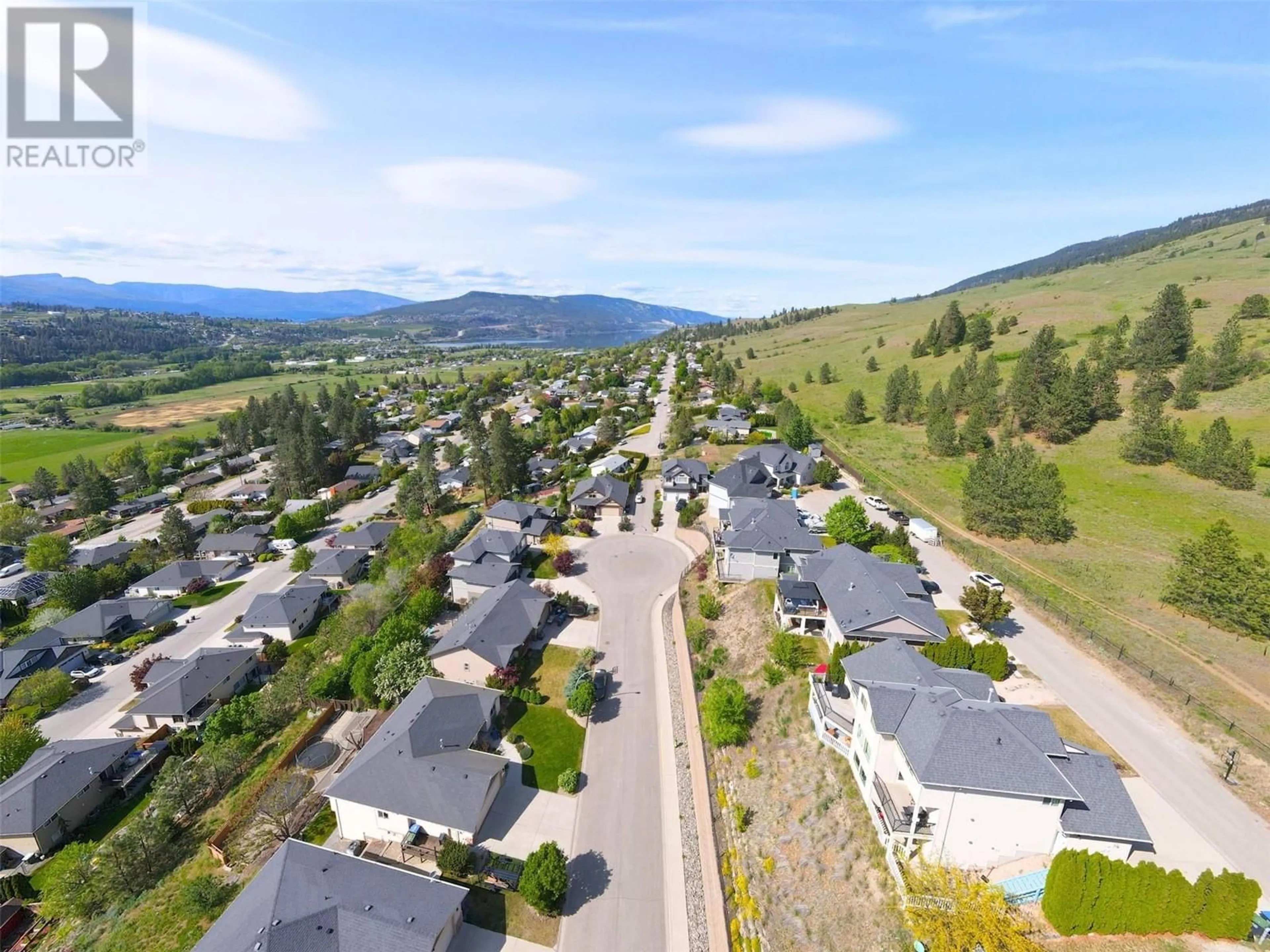 A pic from outside/outdoor area/front of a property/back of a property/a pic from drone, mountain view for 10458 COPPER HILL PLACE, Lake Country British Columbia V4V2P3