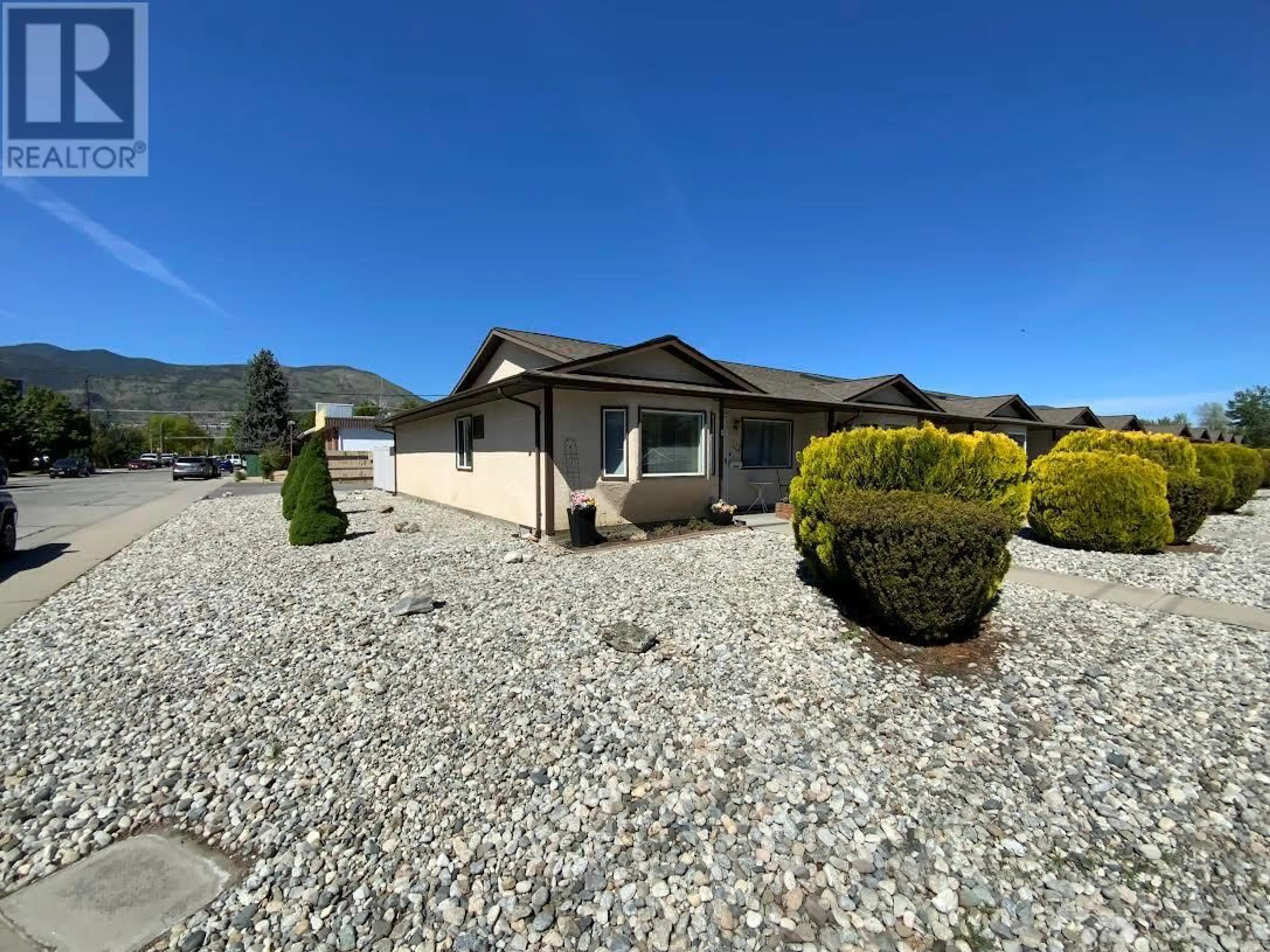 A pic from outside/outdoor area/front of a property/back of a property/a pic from drone, mountain view for 110 - 3065 WILSON STREET, Penticton British Columbia V2A7K2