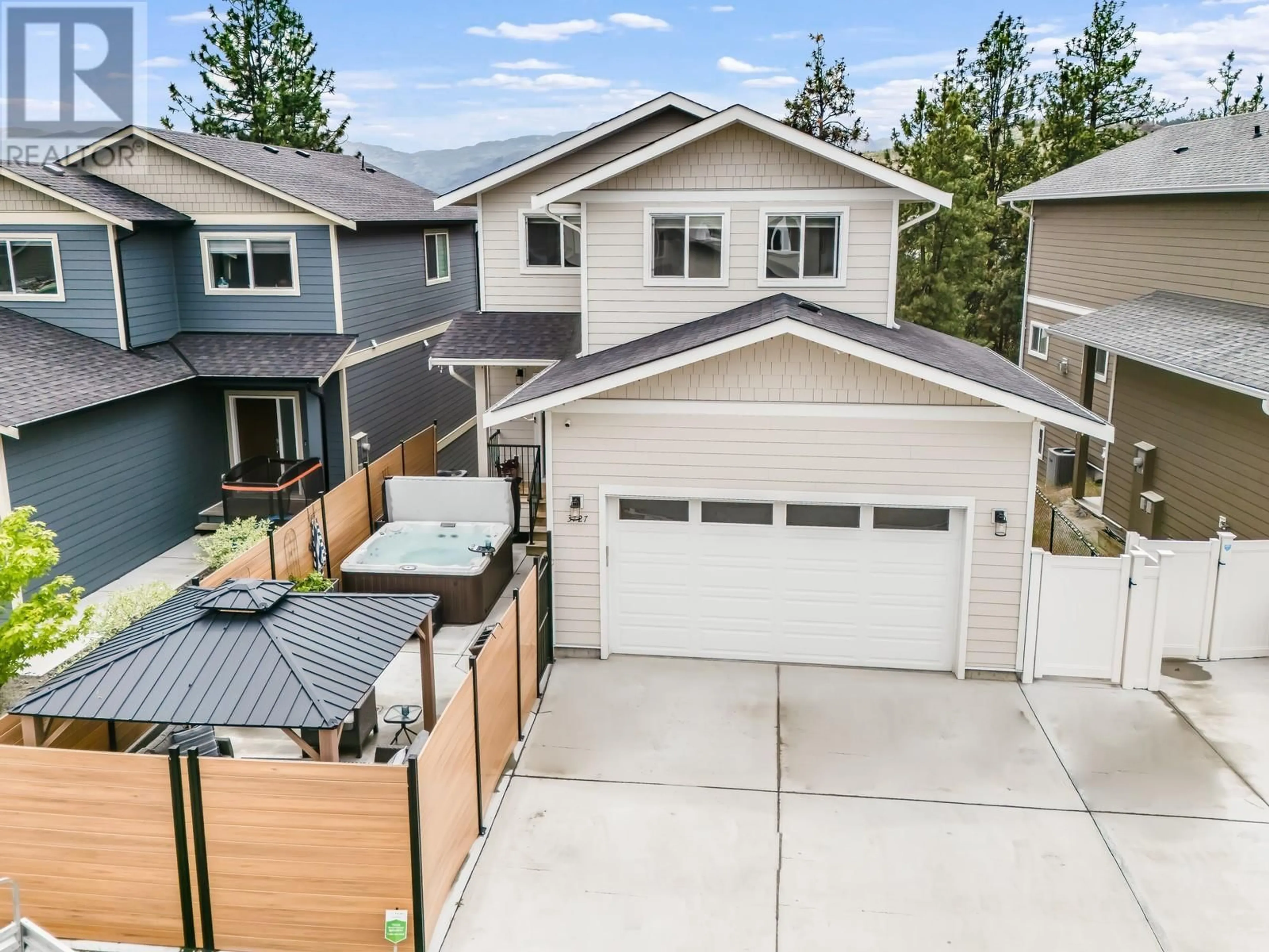 A pic from outside/outdoor area/front of a property/back of a property/a pic from drone, street for 3727 INVERNESS ROAD, West Kelowna British Columbia V4T3N2