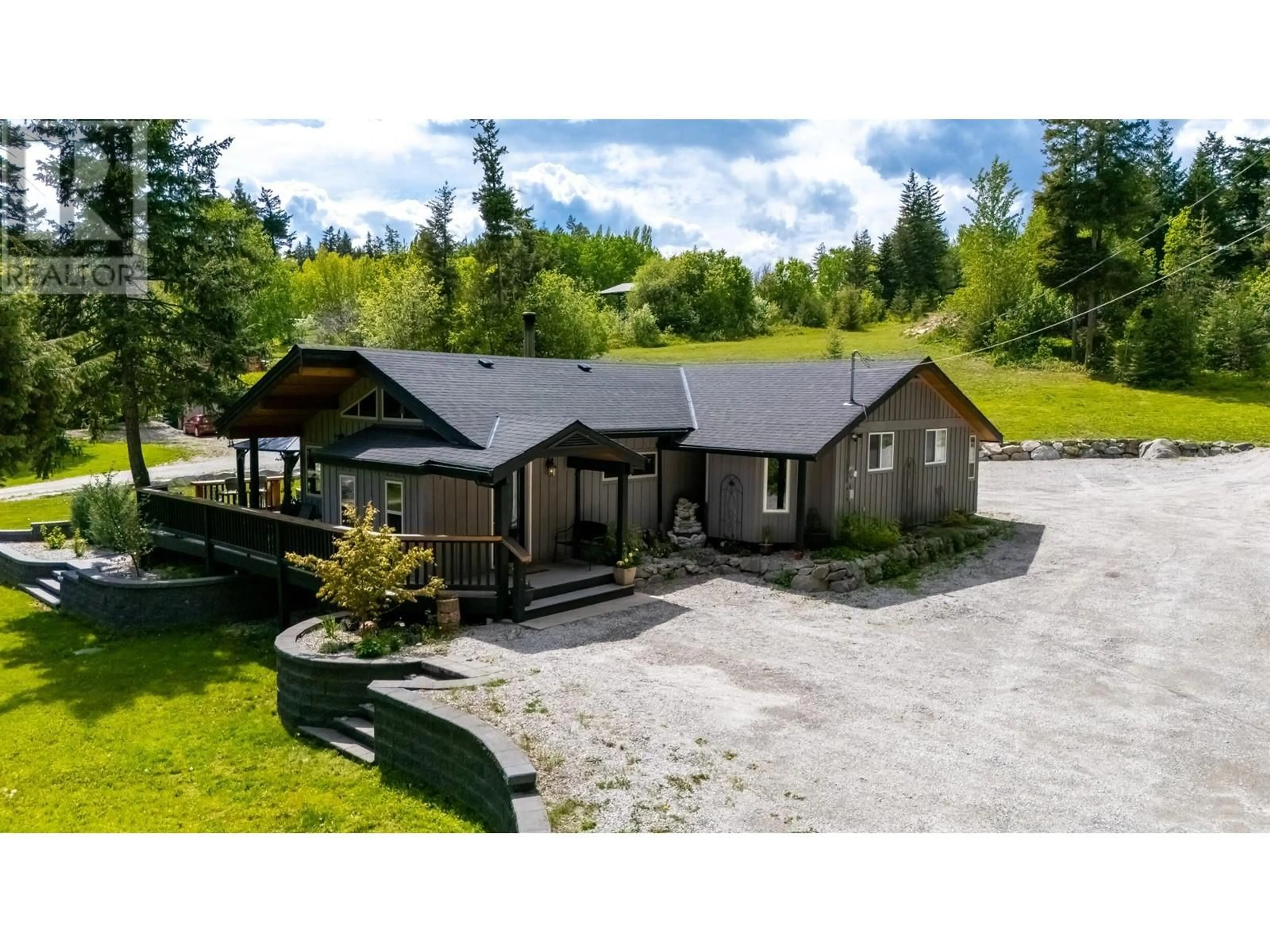 A pic from outside/outdoor area/front of a property/back of a property/a pic from drone, unknown for 3402 MCKELLAR ROAD, West Kelowna British Columbia V4T1W1