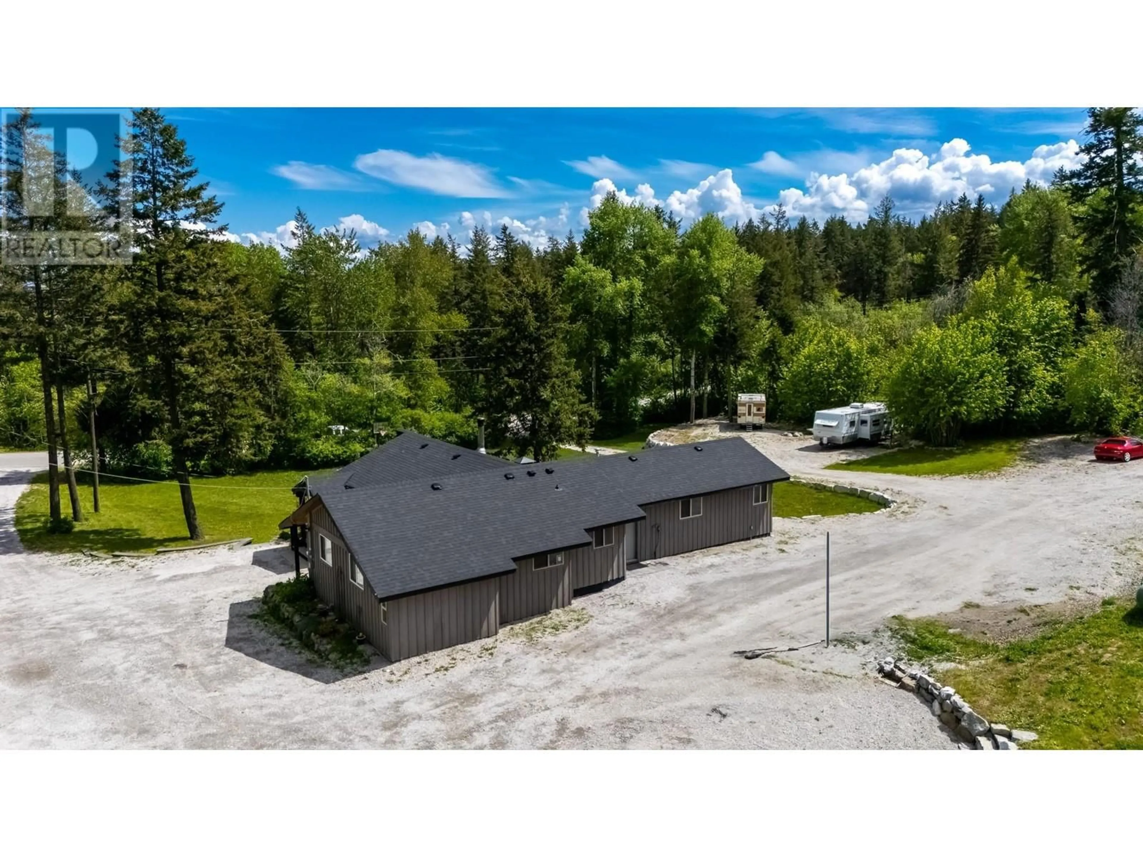 A pic from outside/outdoor area/front of a property/back of a property/a pic from drone, unknown for 3402 MCKELLAR ROAD, West Kelowna British Columbia V4T1W1
