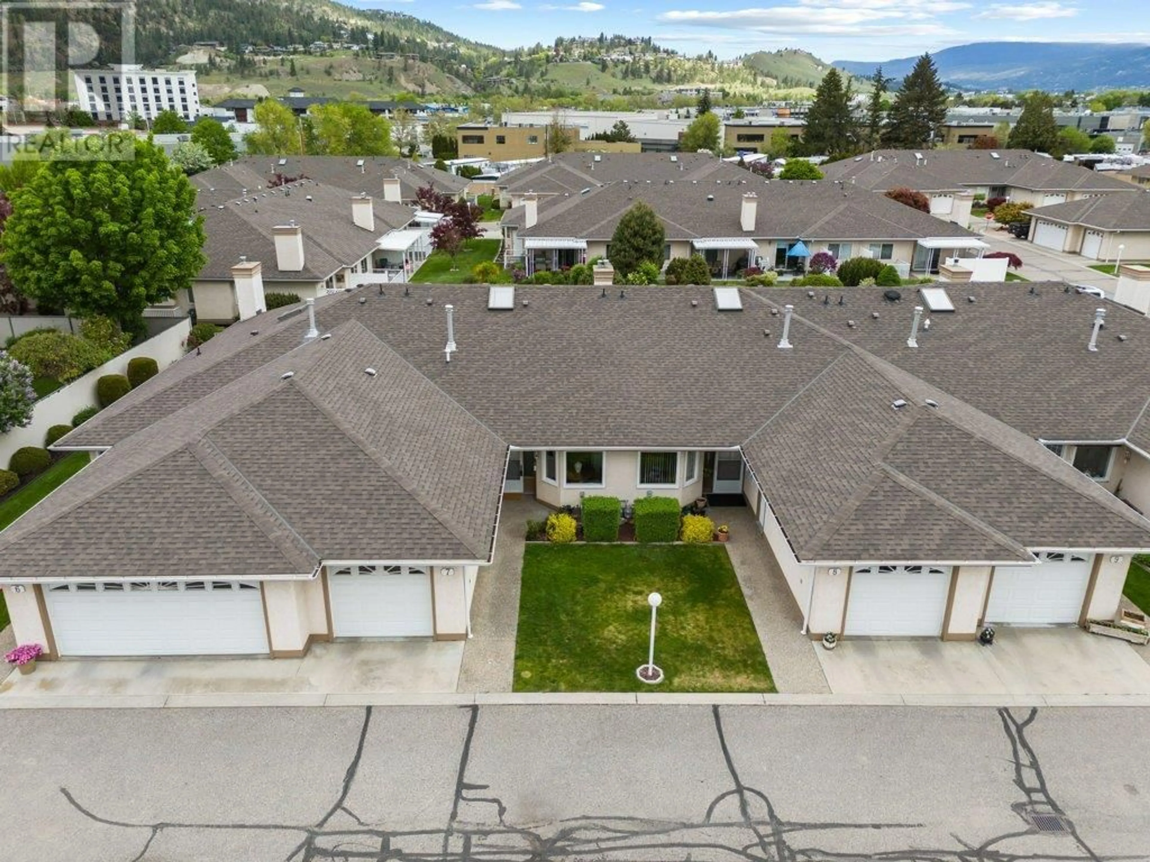 A pic from outside/outdoor area/front of a property/back of a property/a pic from drone, unknown for 7 - 1874 PARKVIEW CRESCENT, Kelowna British Columbia V1X7G6
