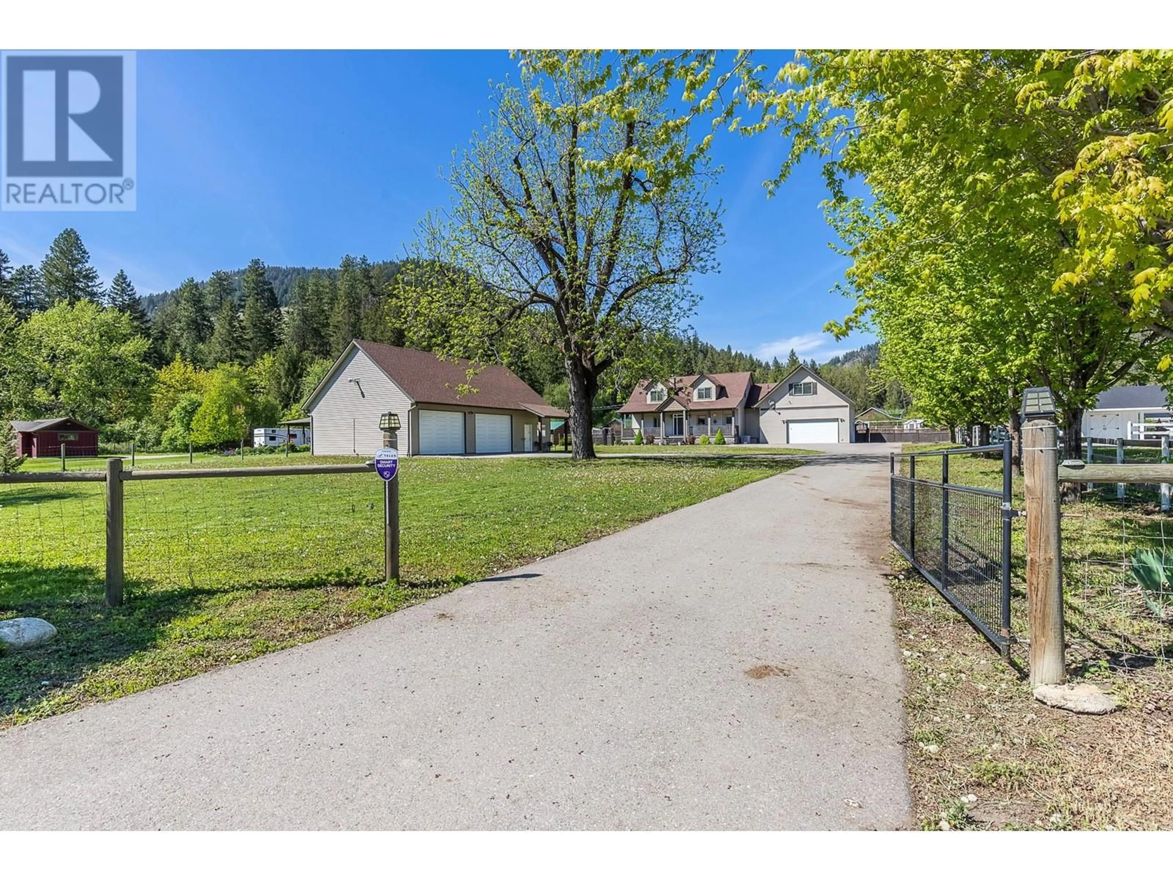 A pic from outside/outdoor area/front of a property/back of a property/a pic from drone, street for 5575 HIGHWAY 6 HIGHWAY, Coldstream British Columbia V1T3E2