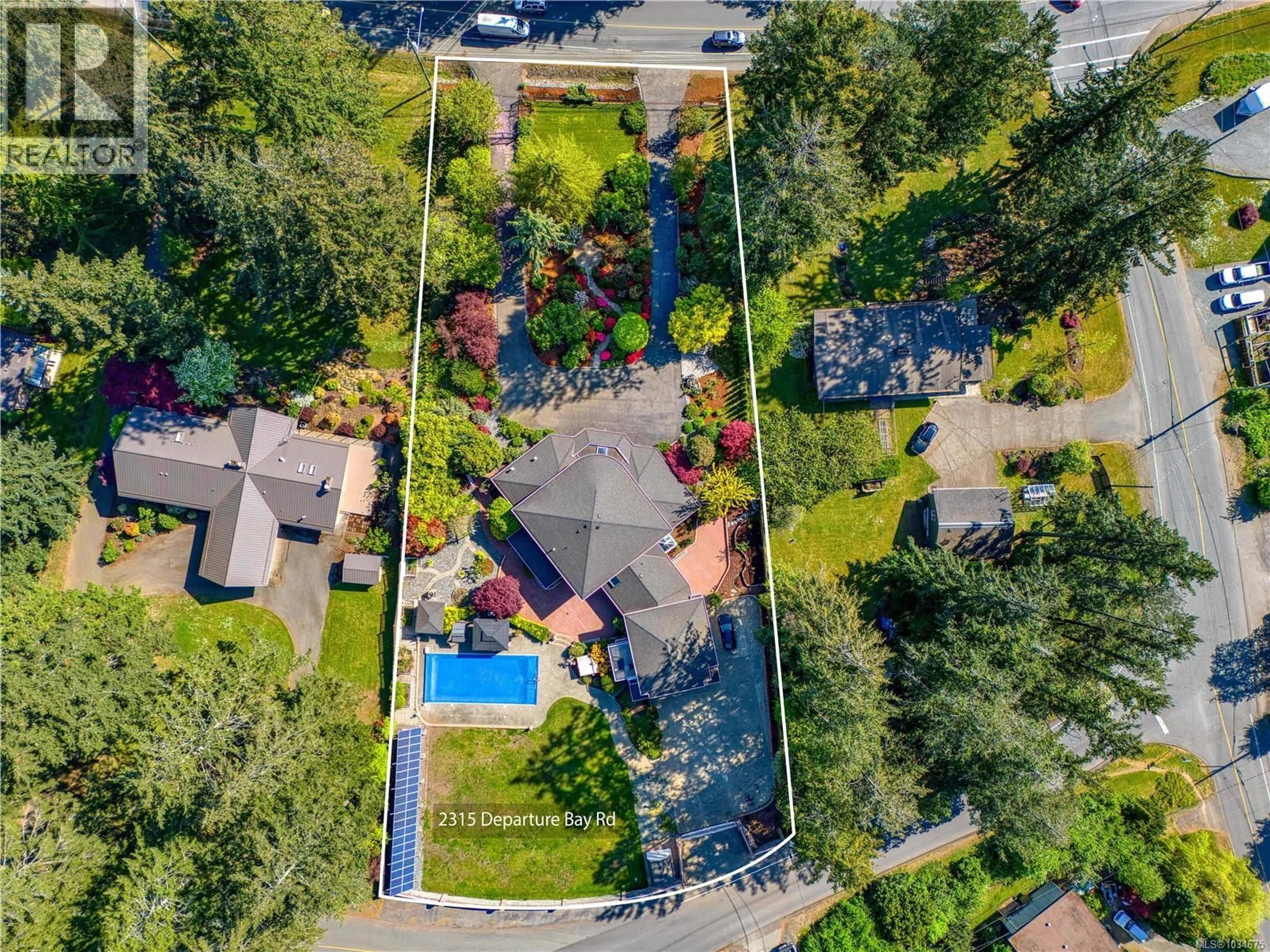 A pic from outside/outdoor area/front of a property/back of a property/a pic from drone, street for 2315 DEPARTURE BAY ROAD, Nanaimo British Columbia V9S3V9