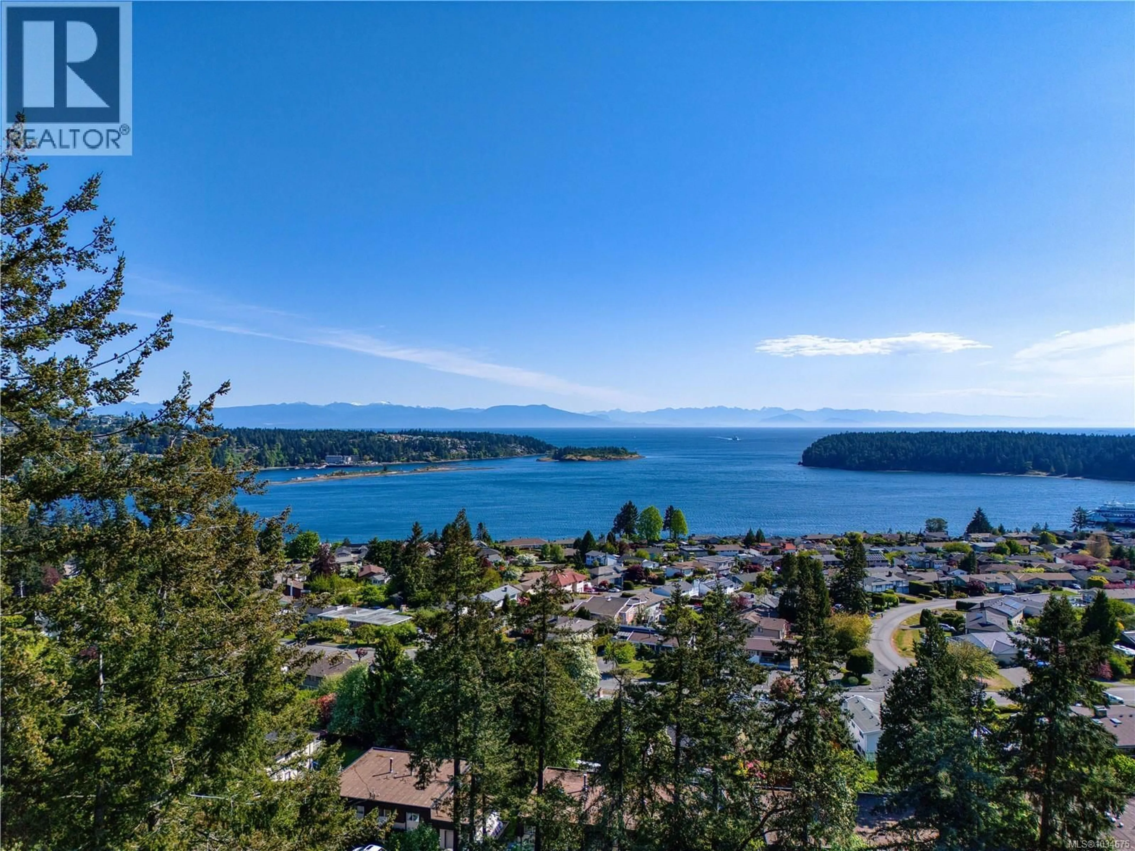 A pic from outside/outdoor area/front of a property/back of a property/a pic from drone, water/lake/river/ocean view for 2315 DEPARTURE BAY ROAD, Nanaimo British Columbia V9S3V9