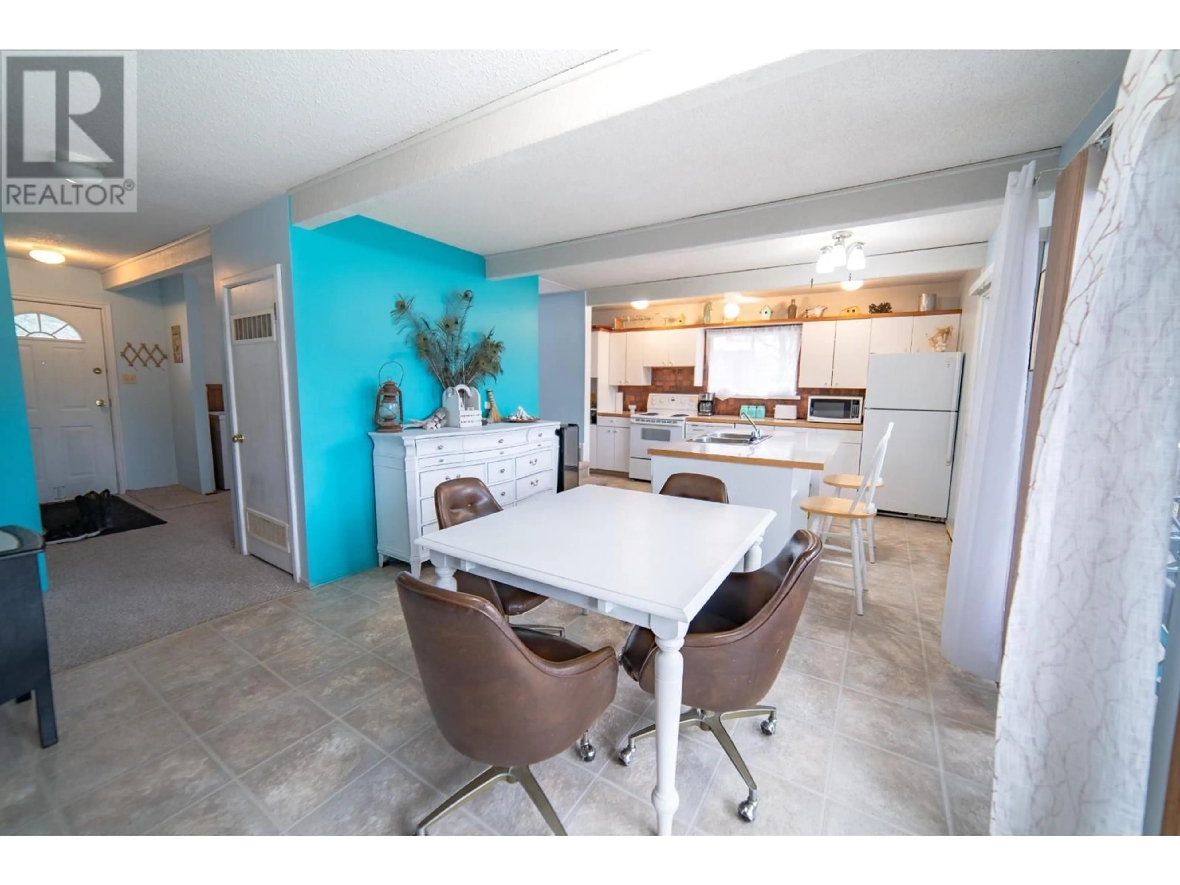 Open concept kitchen, ceramic/tile floor for 309 FOWLER STREET, Riondel British Columbia V0B2B0