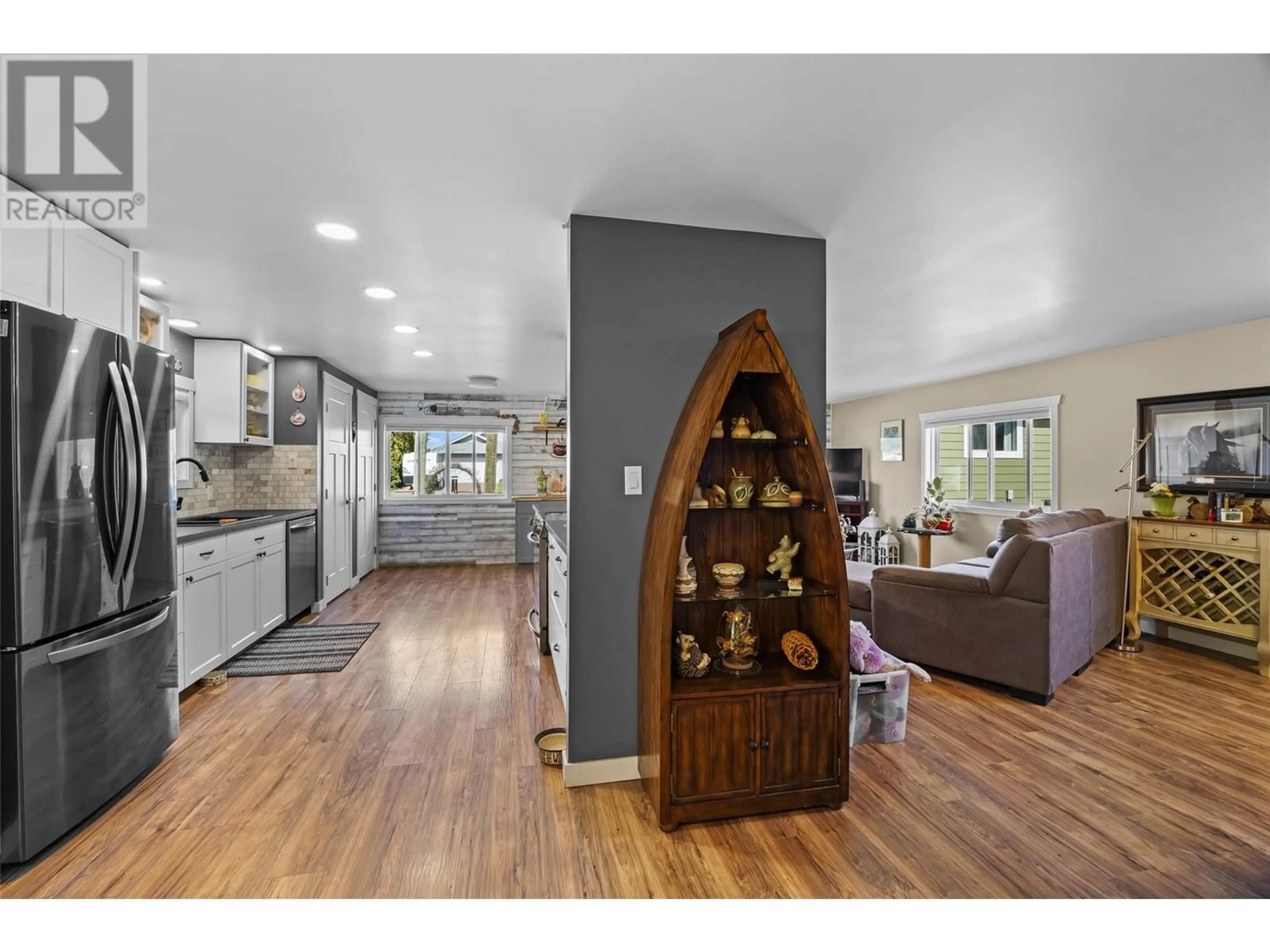 Open concept kitchen, wood/laminate floor for 518 PINE STREET, Chase British Columbia V0E1M0