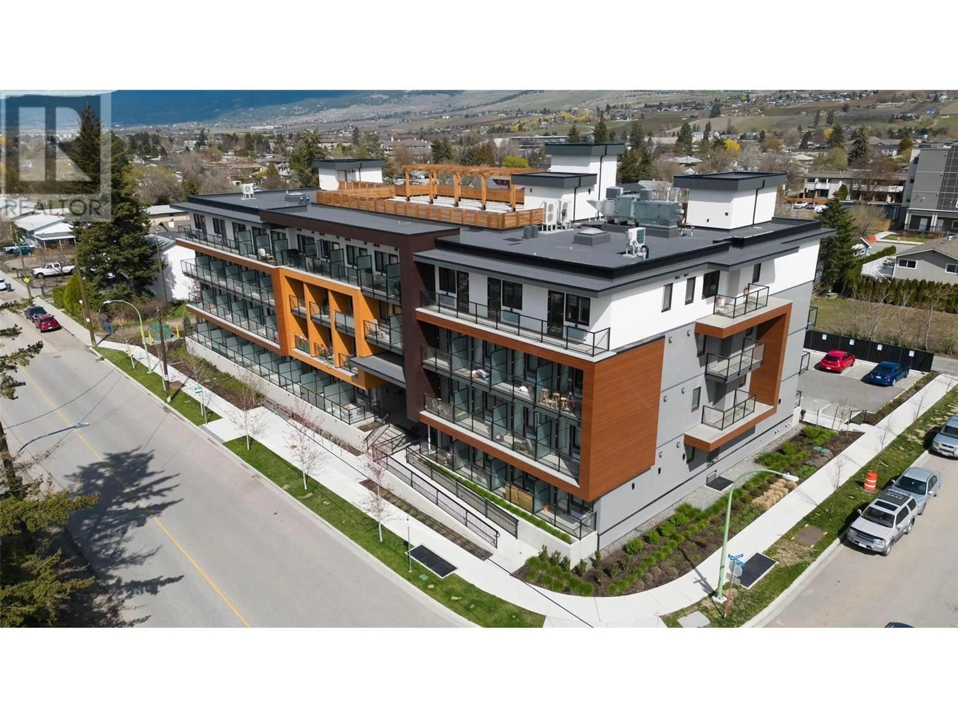 A pic from outside/outdoor area/front of a property/back of a property/a pic from drone, building for 210 - 345 DOUGALL ROAD NORTH, Kelowna British Columbia V1X0A8