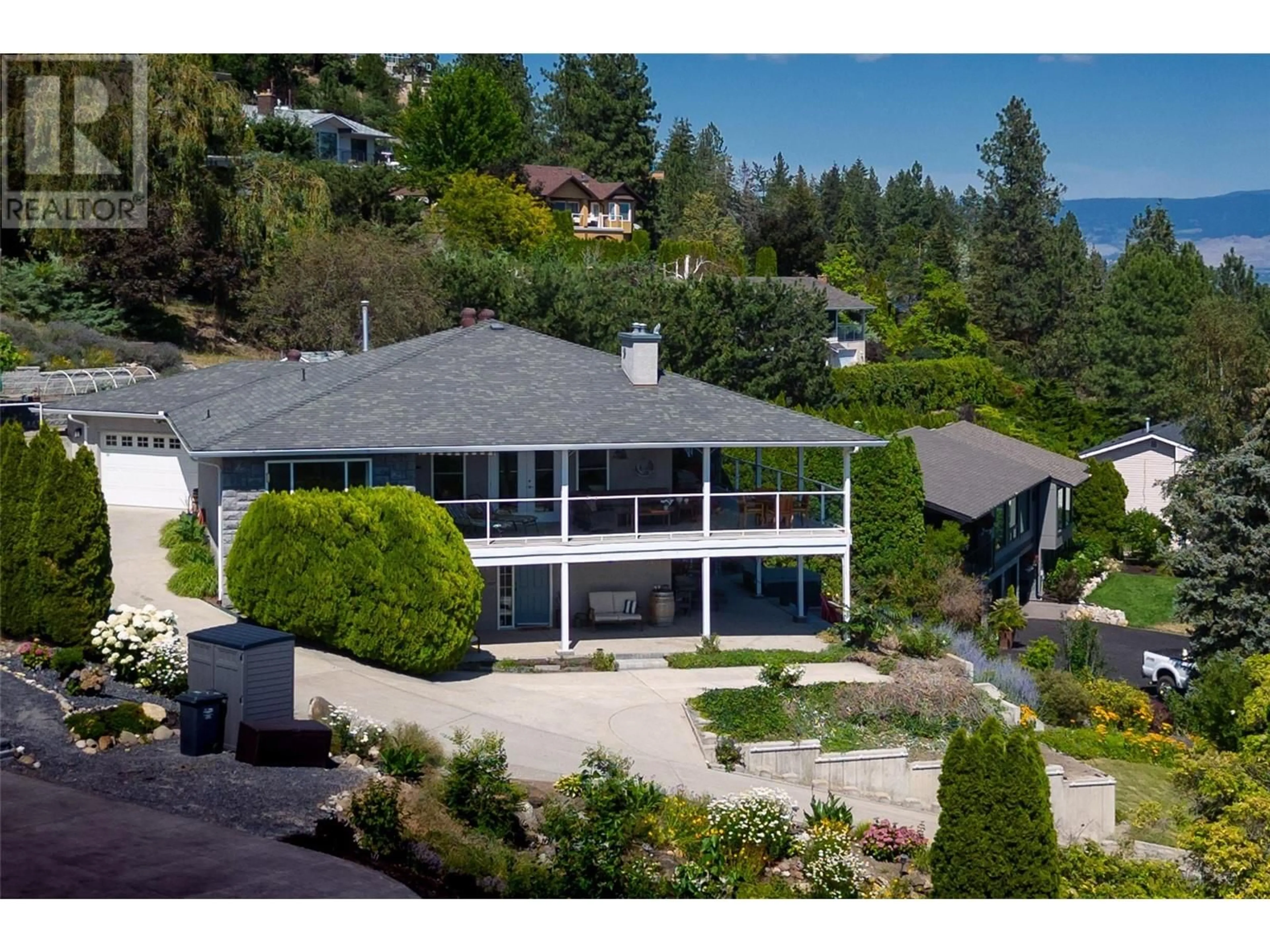 A pic from outside/outdoor area/front of a property/back of a property/a pic from drone, water/lake/river/ocean view for 1290 MENU ROAD, West Kelowna British Columbia V1Z3K2