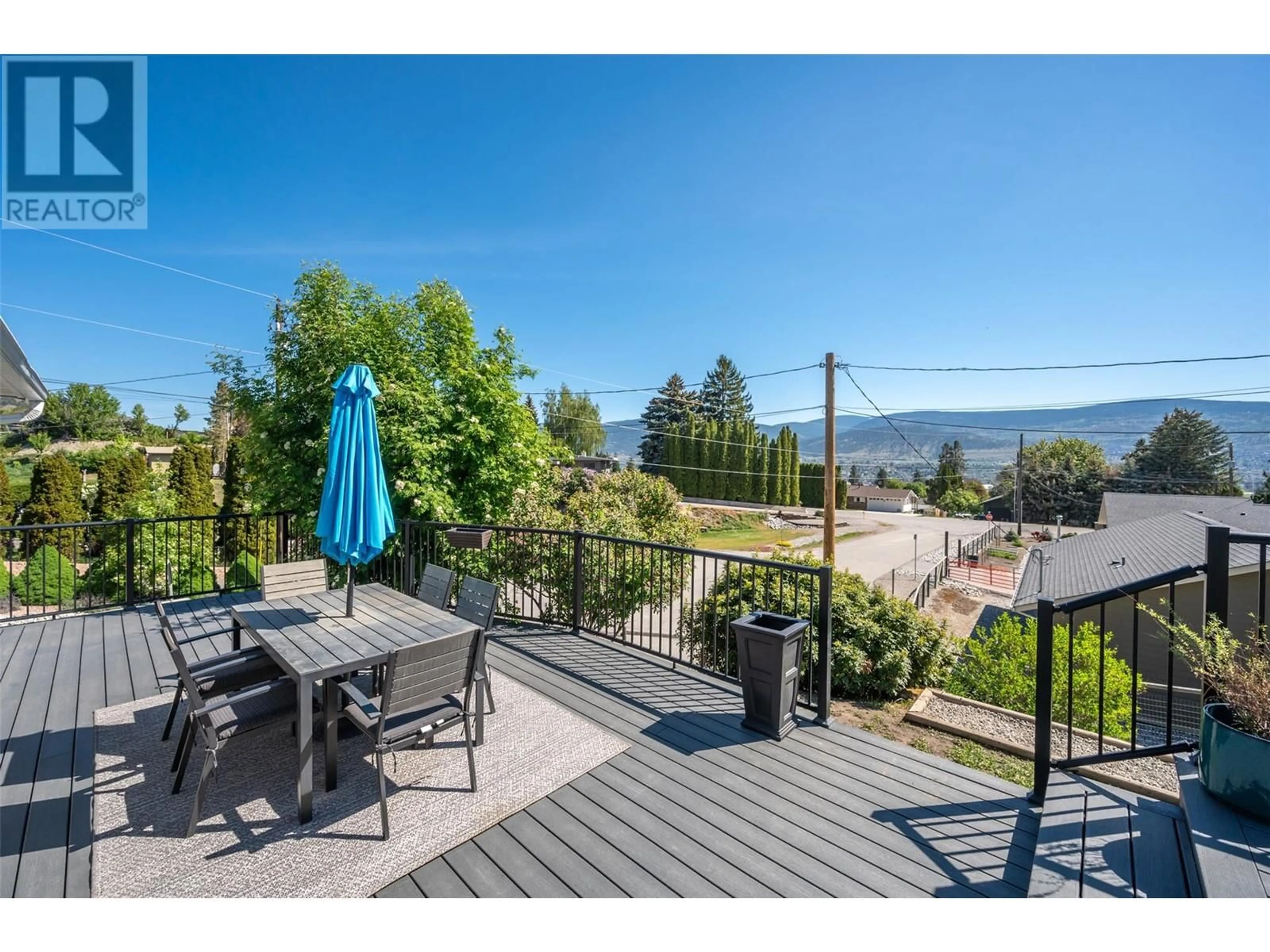A pic from outside/outdoor area/front of a property/back of a property/a pic from drone, mountain view for 1107 PARK PLACE, Penticton British Columbia V2A8X9