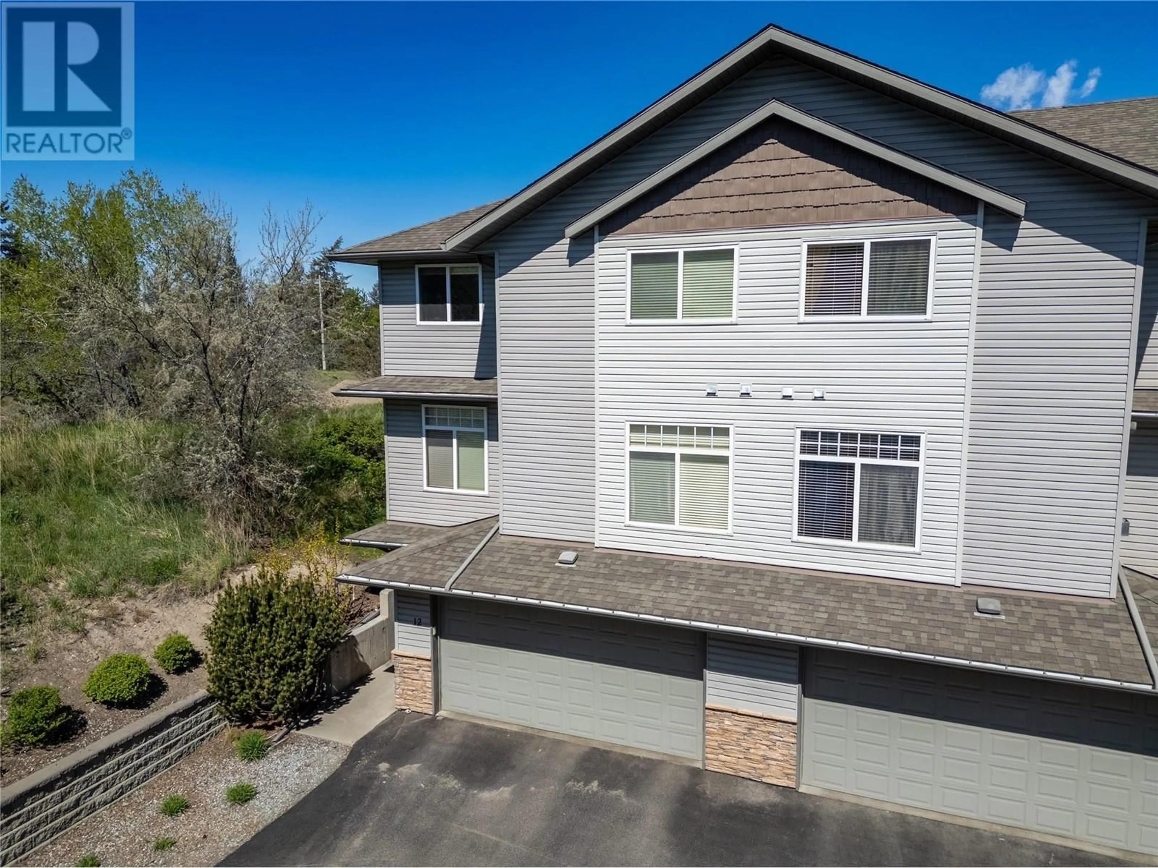 A pic from outside/outdoor area/front of a property/back of a property/a pic from drone, street for 12 - 2046 ROBSON PLACE, Kamloops British Columbia V2E0A5