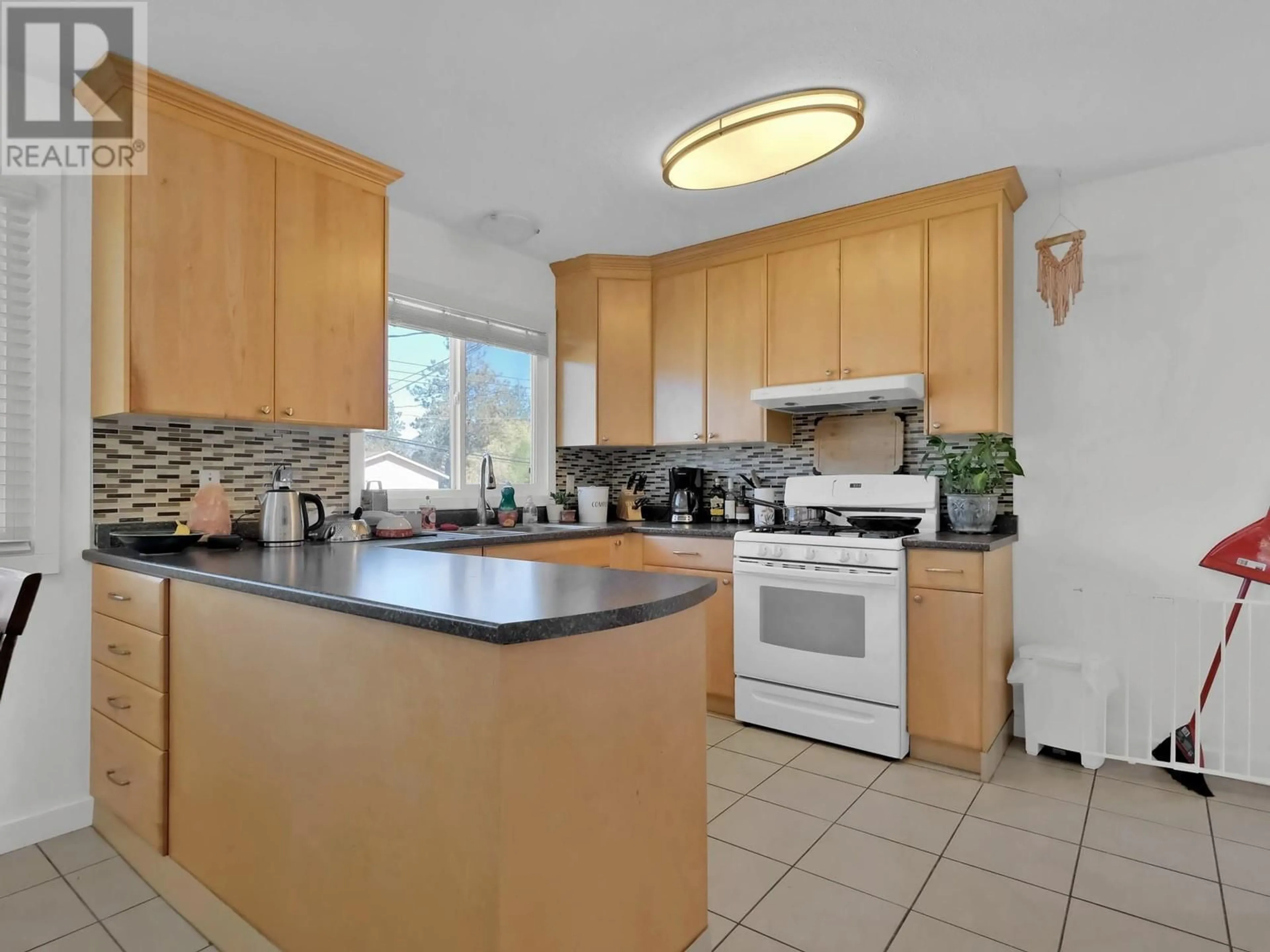 Standard kitchen, ceramic/tile floor for 1482 COLUMBIA STREET, Penticton British Columbia V2A3X8