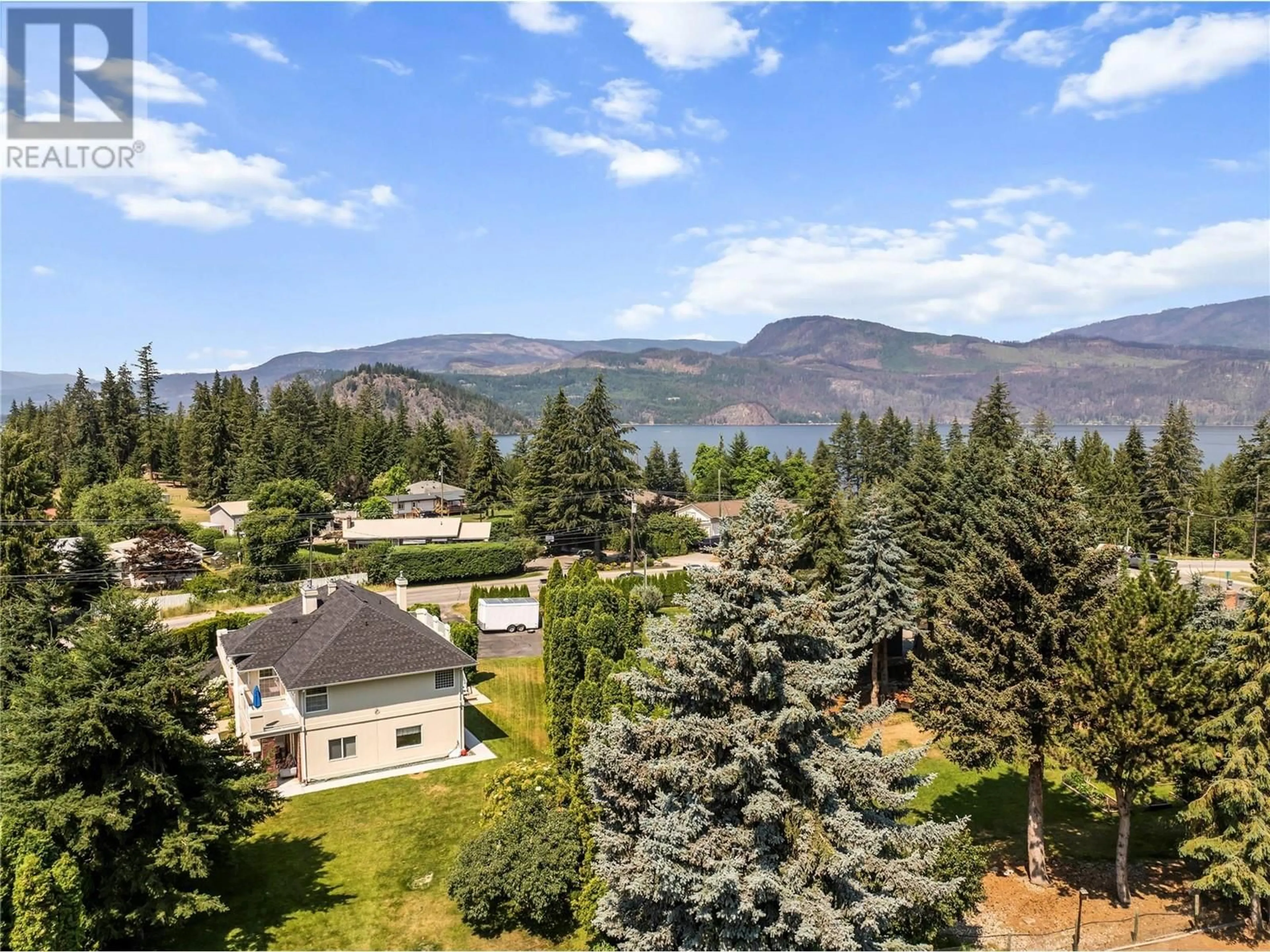A pic from outside/outdoor area/front of a property/back of a property/a pic from drone, water/lake/river/ocean view for 2422 EAGLE BAY ROAD, Blind Bay British Columbia V0E1H1