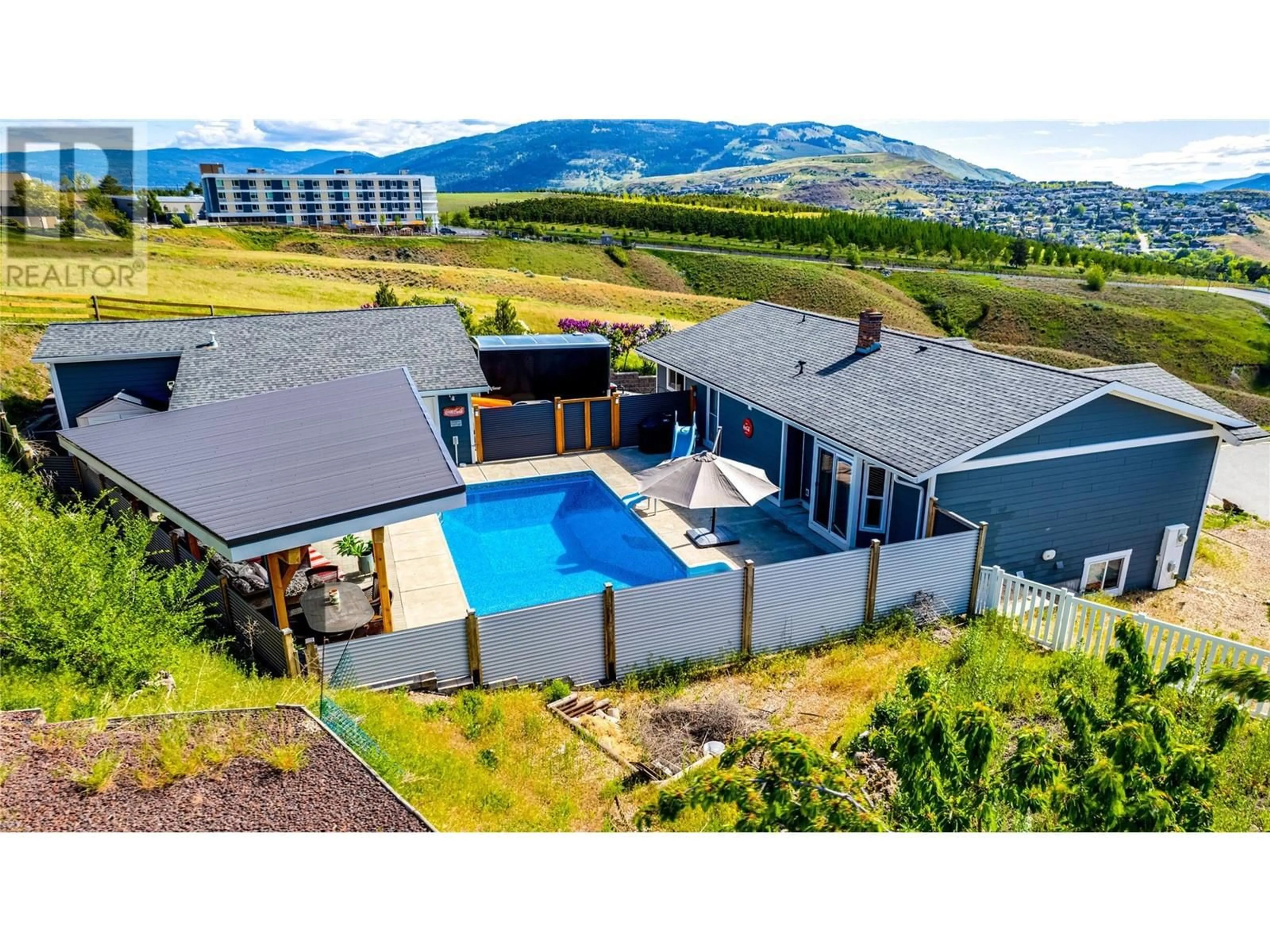 A pic from outside/outdoor area/front of a property/back of a property/a pic from drone, mountain view for 9090 COLLEGE DRIVE, Coldstream British Columbia V1B2P7