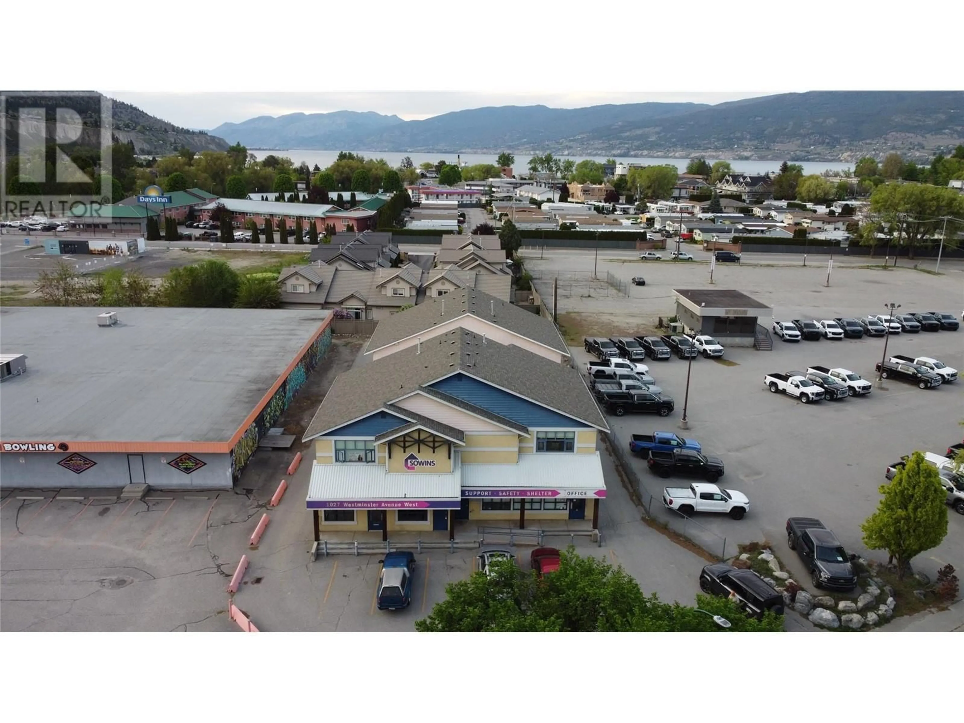 A pic from outside/outdoor area/front of a property/back of a property/a pic from drone, mountain view for 203 - 1027 WESTMINSTER AVENUE, Penticton British Columbia V2A1L4