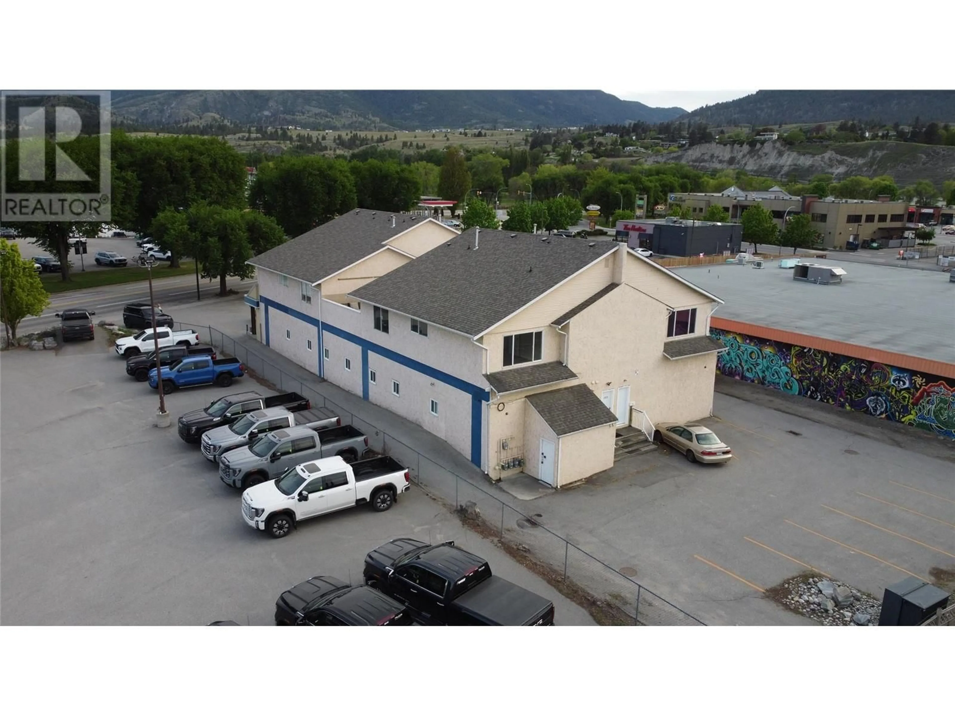 A pic from outside/outdoor area/front of a property/back of a property/a pic from drone, unknown for 203 - 1027 WESTMINSTER AVENUE, Penticton British Columbia V2A1L4