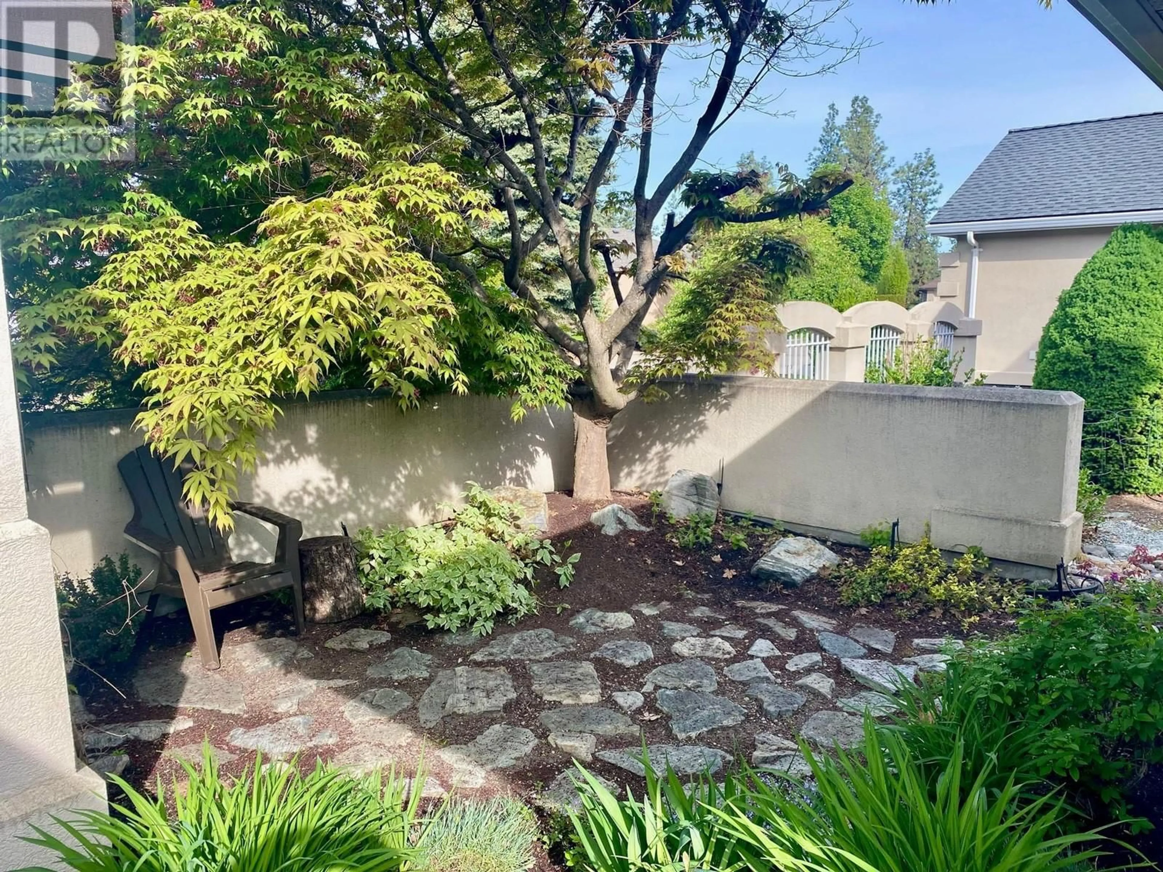 A pic from outside/outdoor area/front of a property/back of a property/a pic from drone, street for 3889 GALLAGHERS OTHER, Kelowna British Columbia V1W3Z9