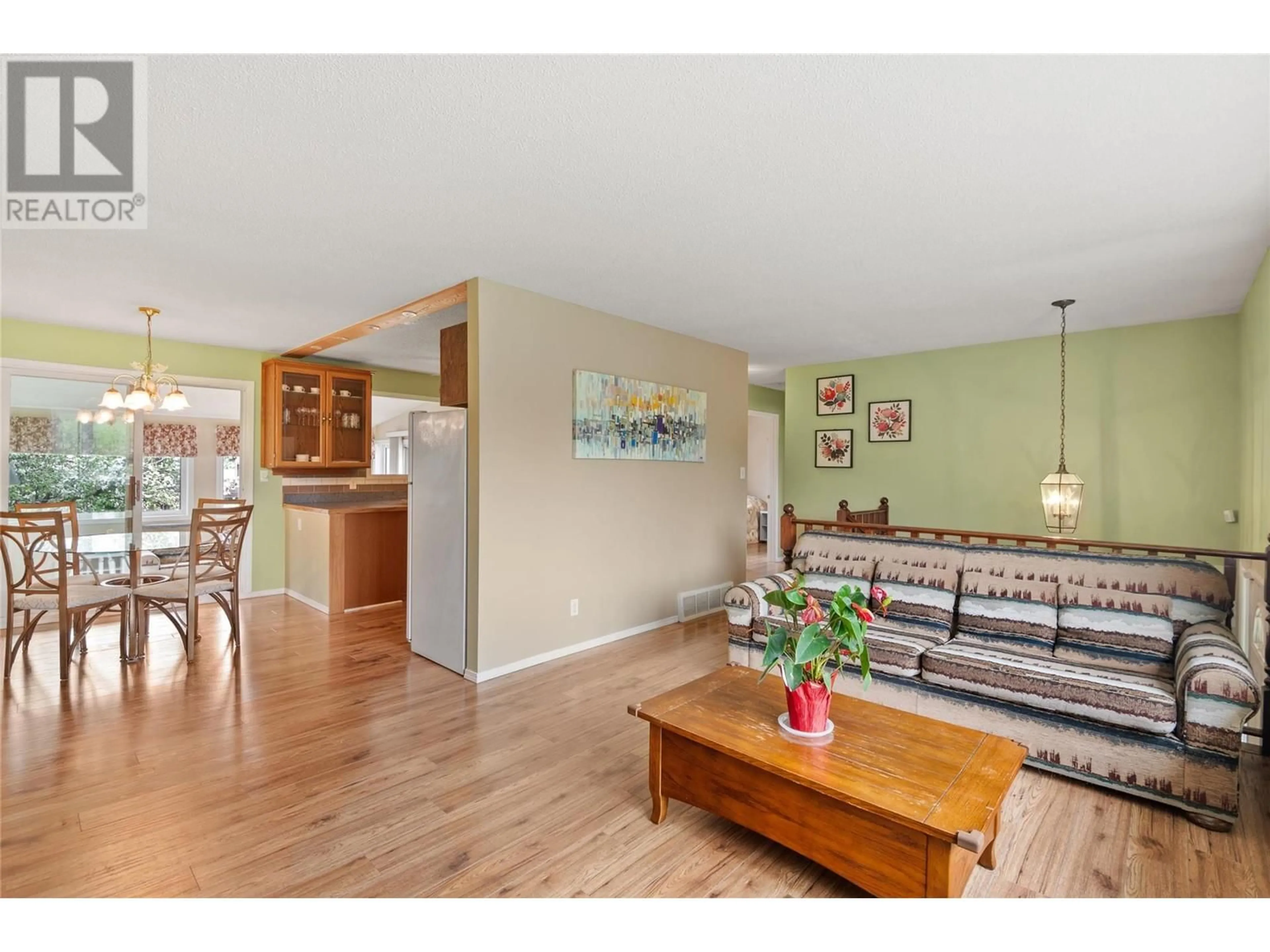 Open concept kitchen, wood/laminate floor for 407 ENGELMANN SPRUCE DRIVE, Sparwood British Columbia V0B2G0