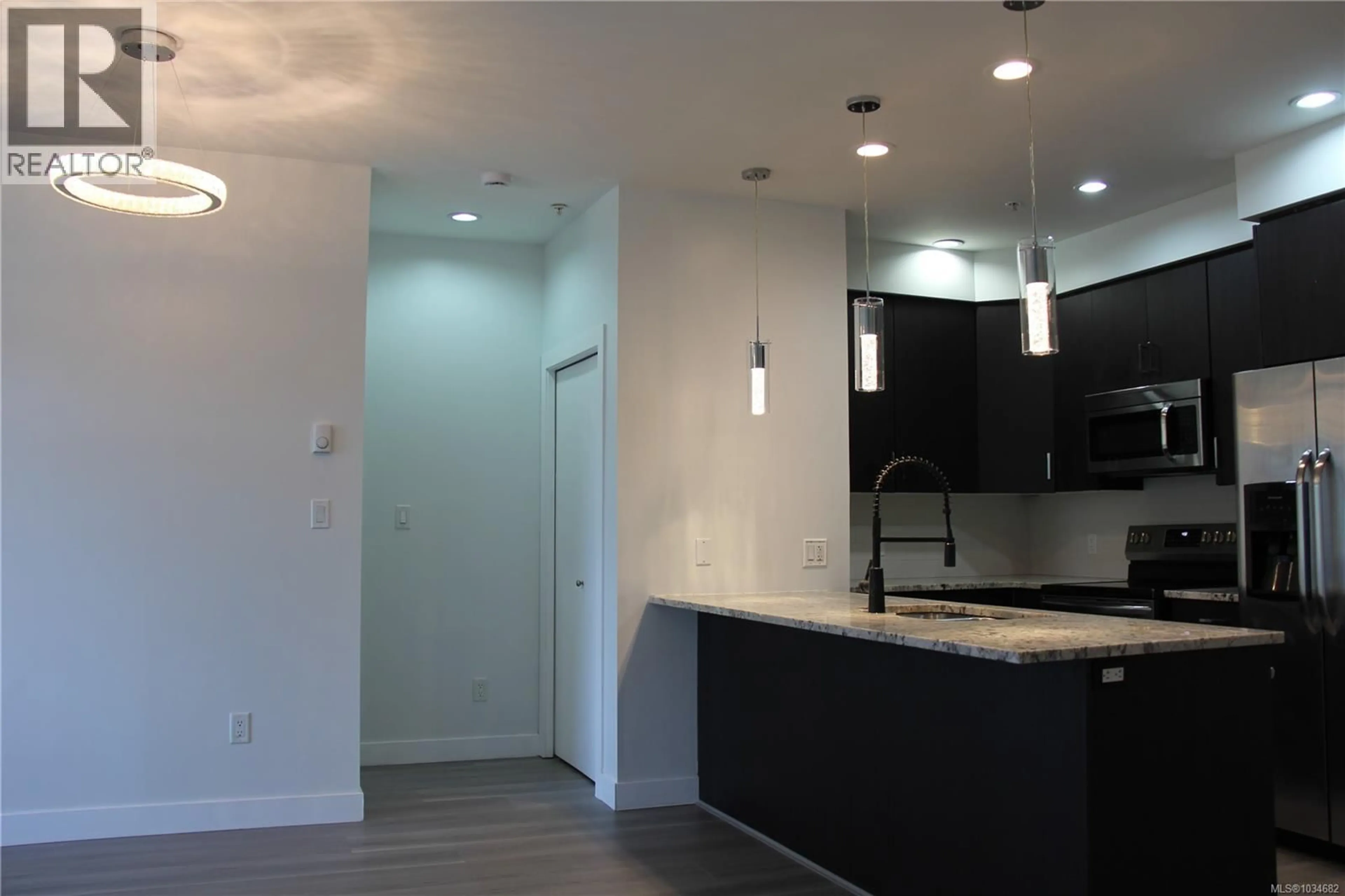 Open concept kitchen, unknown for 312 - 2655 SOOKE ROAD, Langford British Columbia V9B1Y3