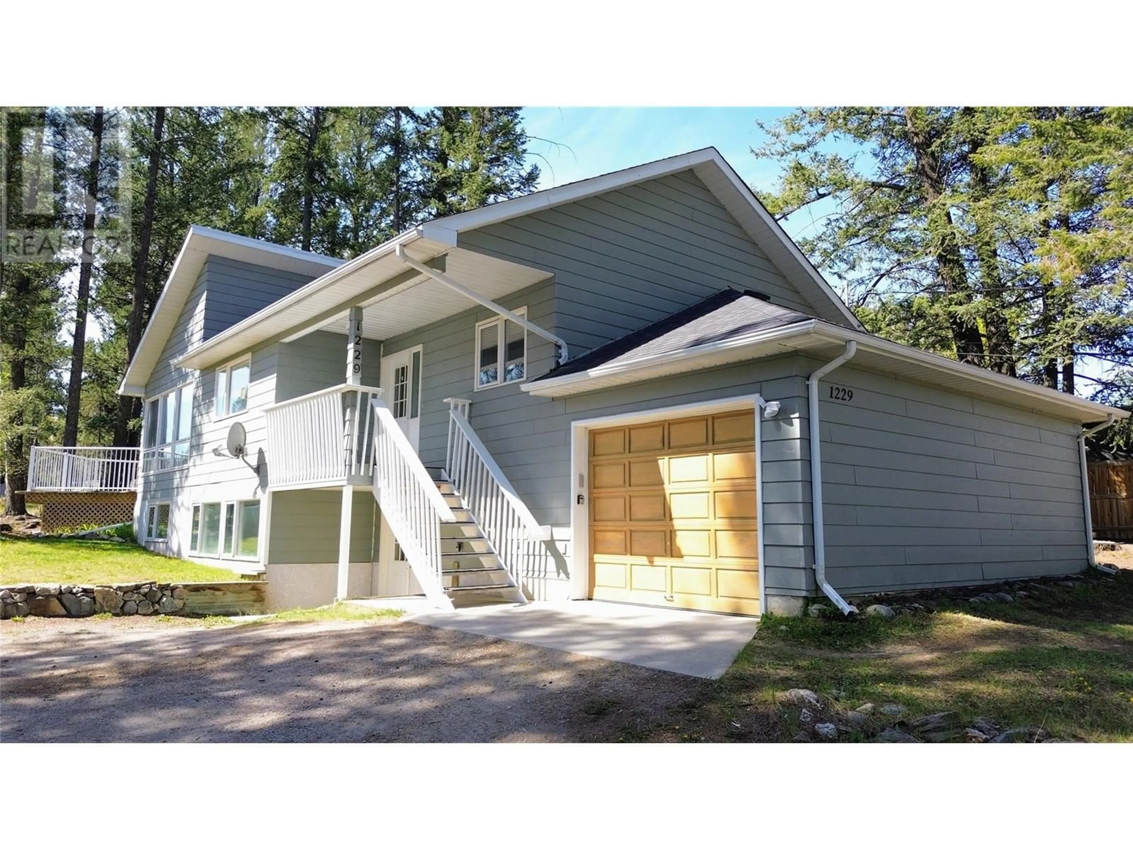 Home with vinyl exterior material, street for 1229 13TH STREET, Invermere British Columbia V0A1K0