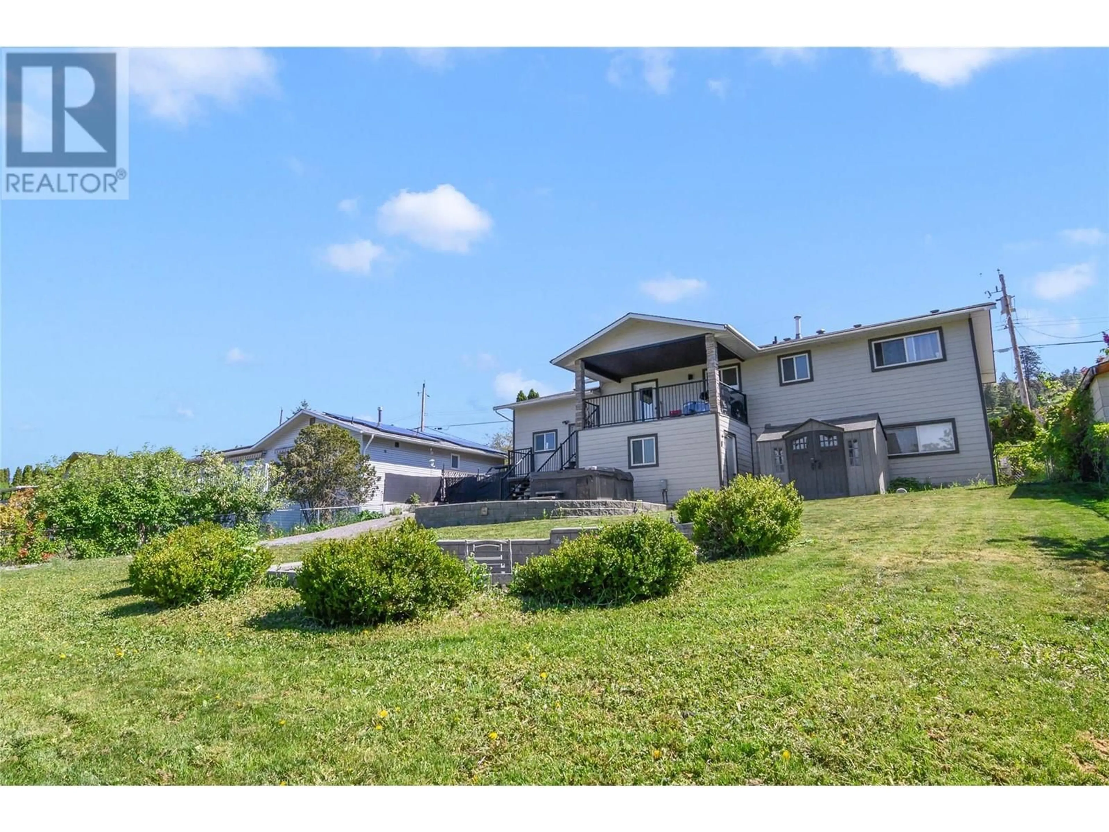 A pic from outside/outdoor area/front of a property/back of a property/a pic from drone, water/lake/river/ocean view for 10580 TERESA ROAD, Lake Country British Columbia V4V1V1