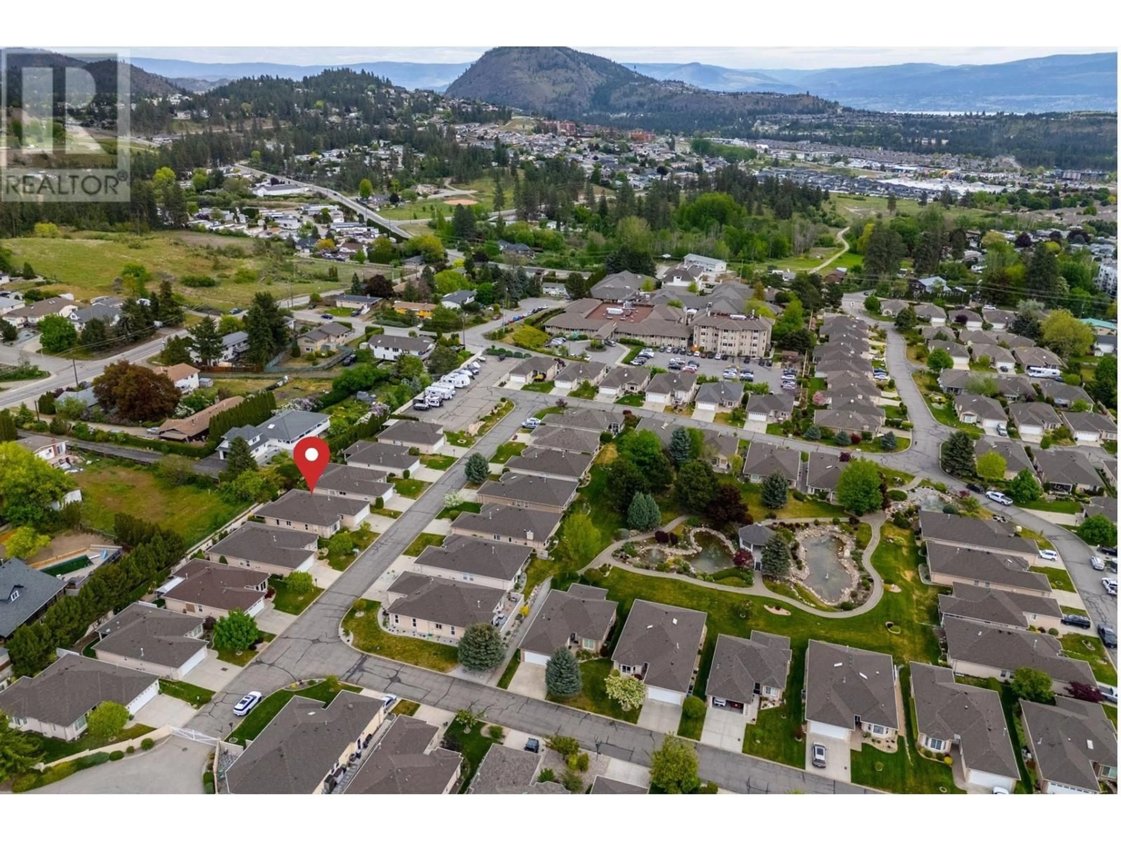 A pic from outside/outdoor area/front of a property/back of a property/a pic from drone, mountain view for 142 - 3360 OLD OKANAGAN HIGHWAY, West Kelowna British Columbia V4T1X9