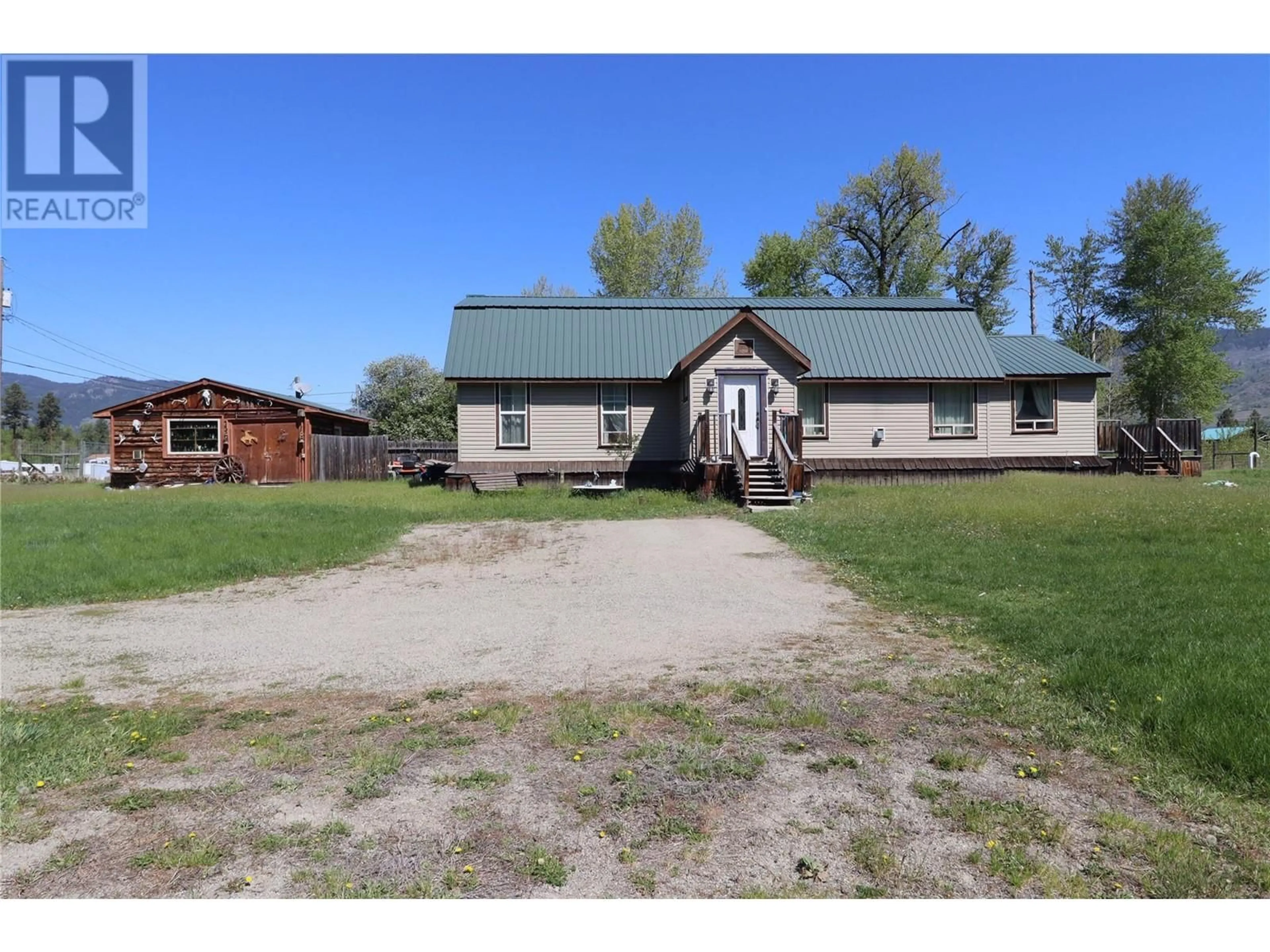 A pic from outside/outdoor area/front of a property/back of a property/a pic from drone, building for 5818 17TH STREET, Grand Forks British Columbia V0H1H0
