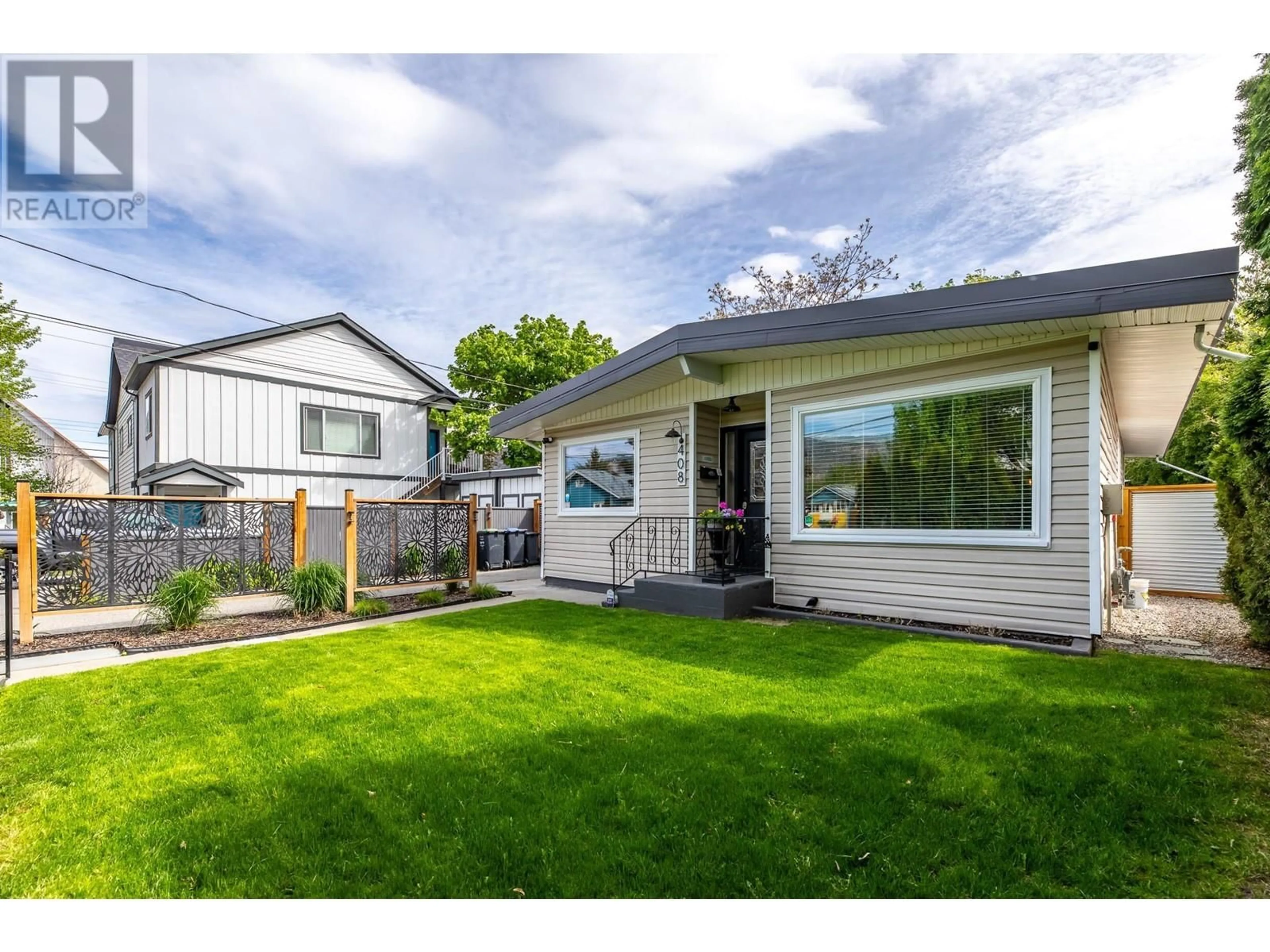 Home with vinyl exterior material, street for 408 TENNIS STREET, Penticton British Columbia V2A5R3