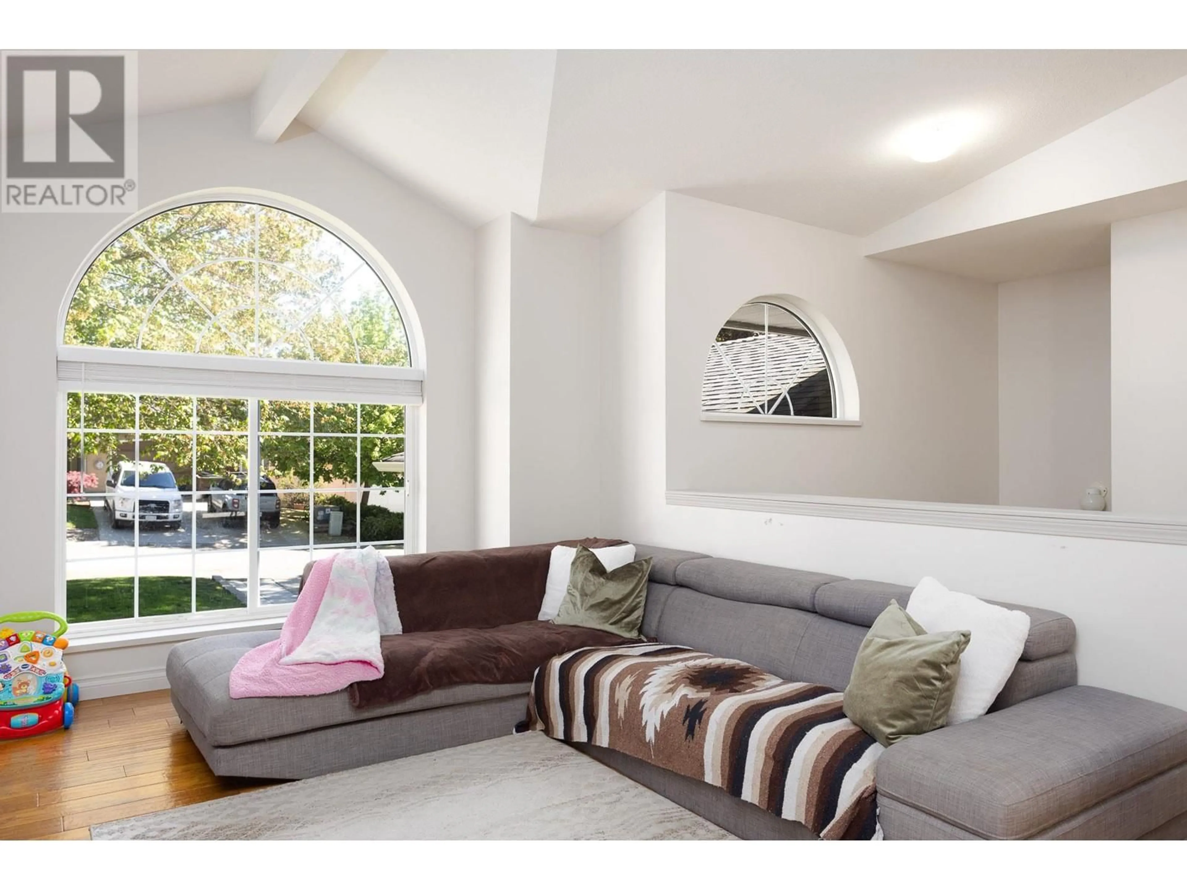 Living room with furniture, unknown for 168 PORTVIEW COURT, Kelowna British Columbia V1V1T9