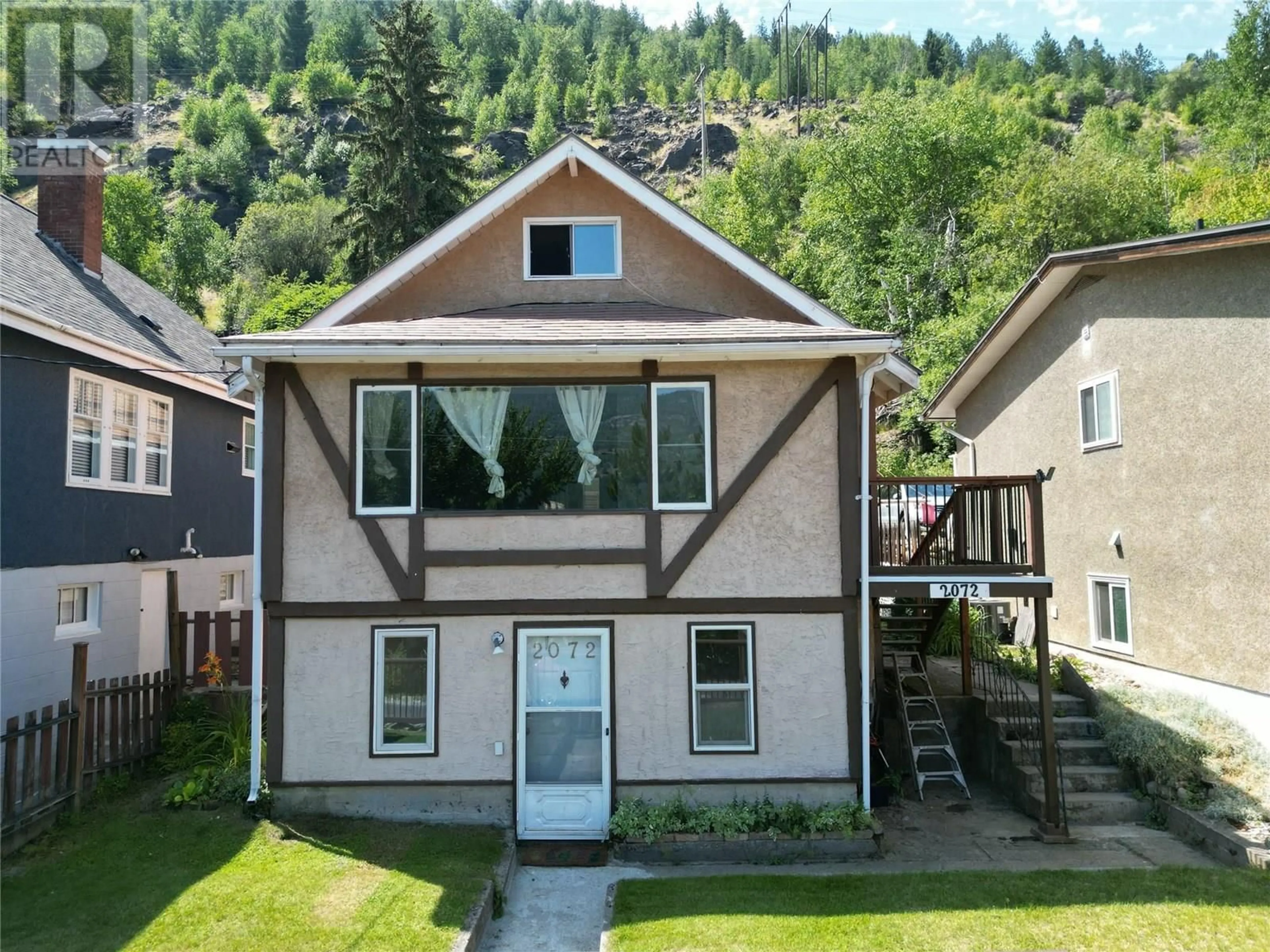 Home with vinyl exterior material, street for 2072 DANIEL STREET, Trail British Columbia V1R4G9