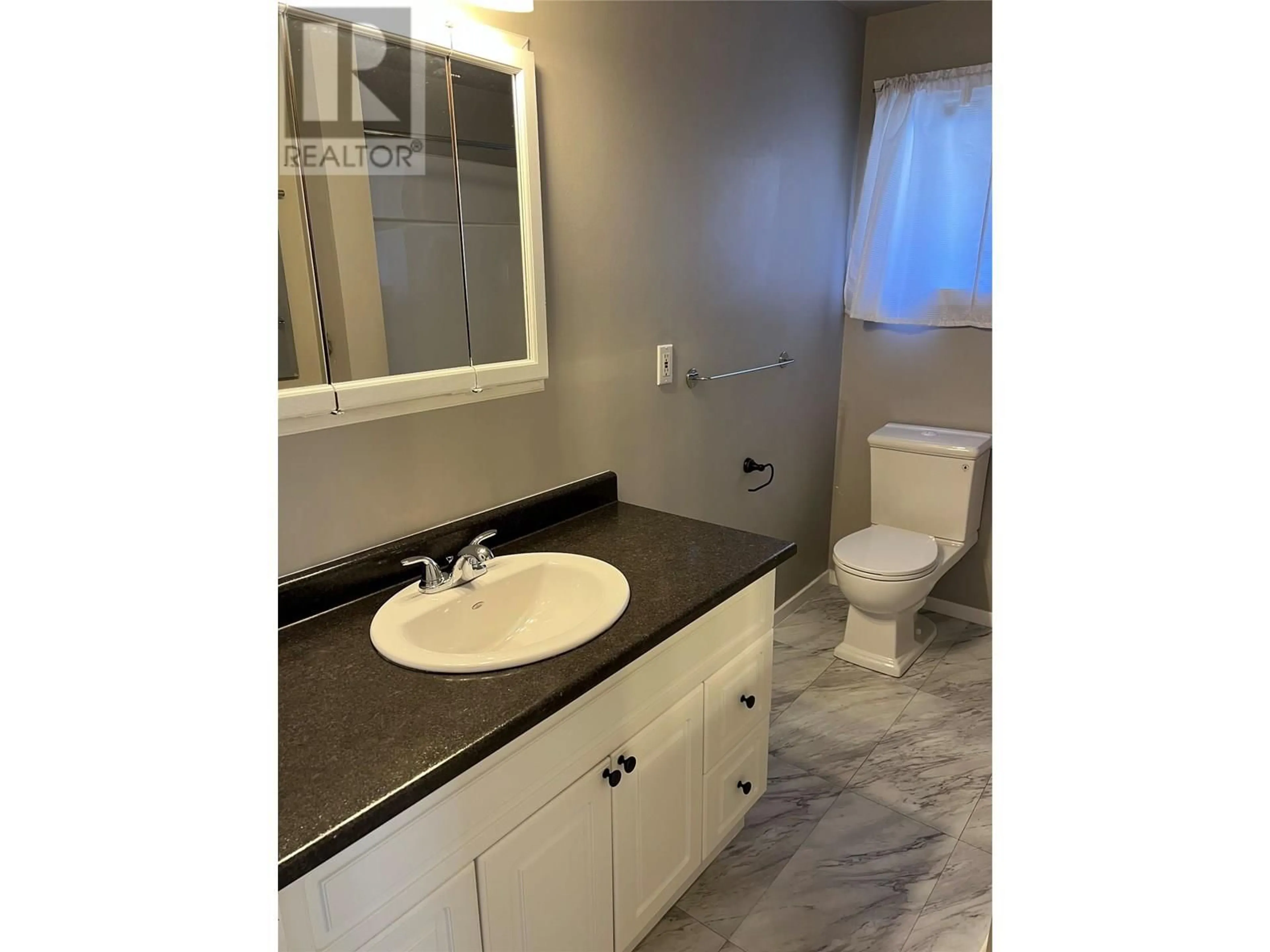 Standard bathroom, ceramic/tile floor for 2072 DANIEL STREET, Trail British Columbia V1R4G9