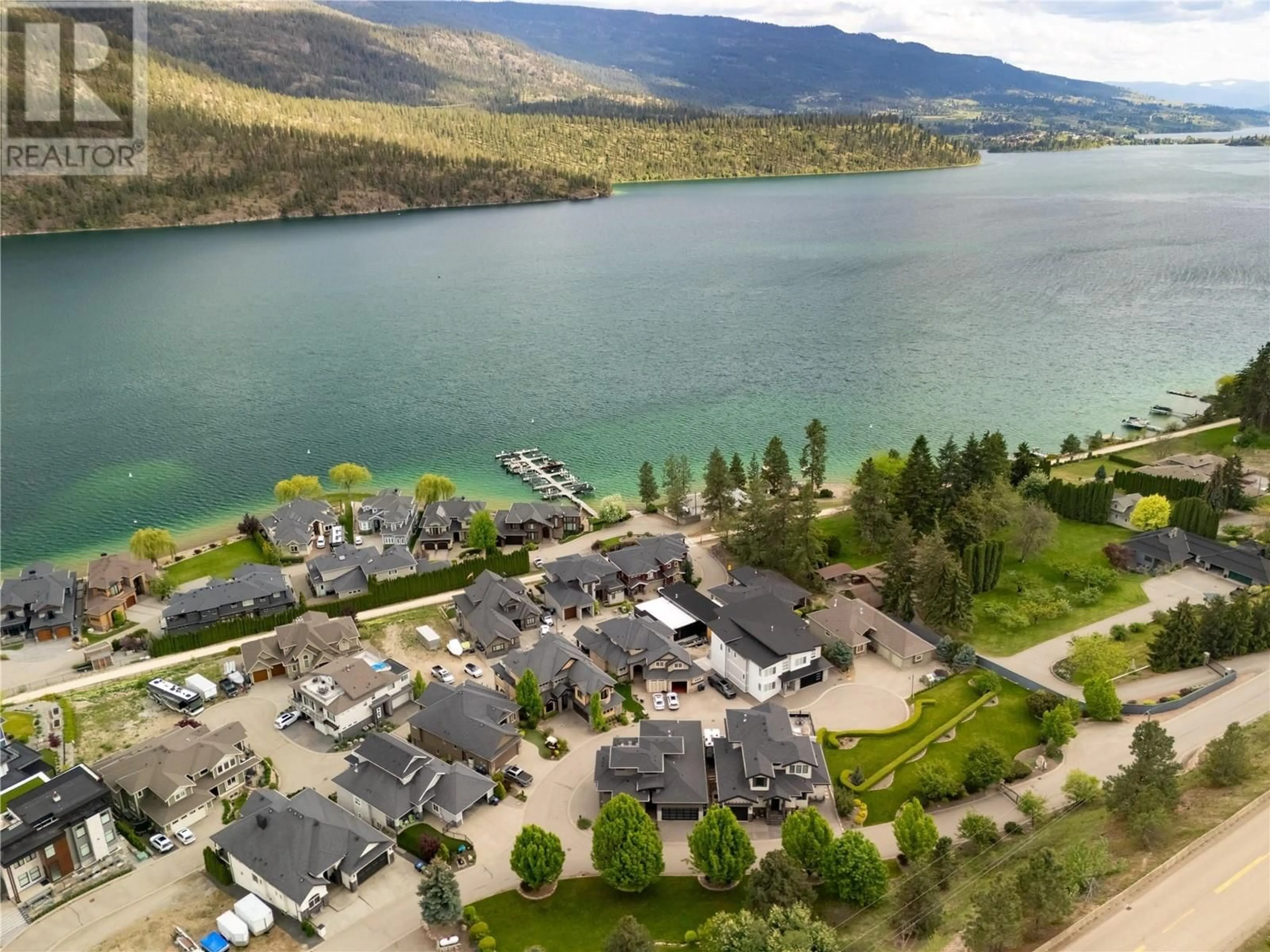 A pic from outside/outdoor area/front of a property/back of a property/a pic from drone, water/lake/river/ocean view for 34 - 18451 CRYSTAL WATERS ROAD, Lake Country British Columbia V4V2G2