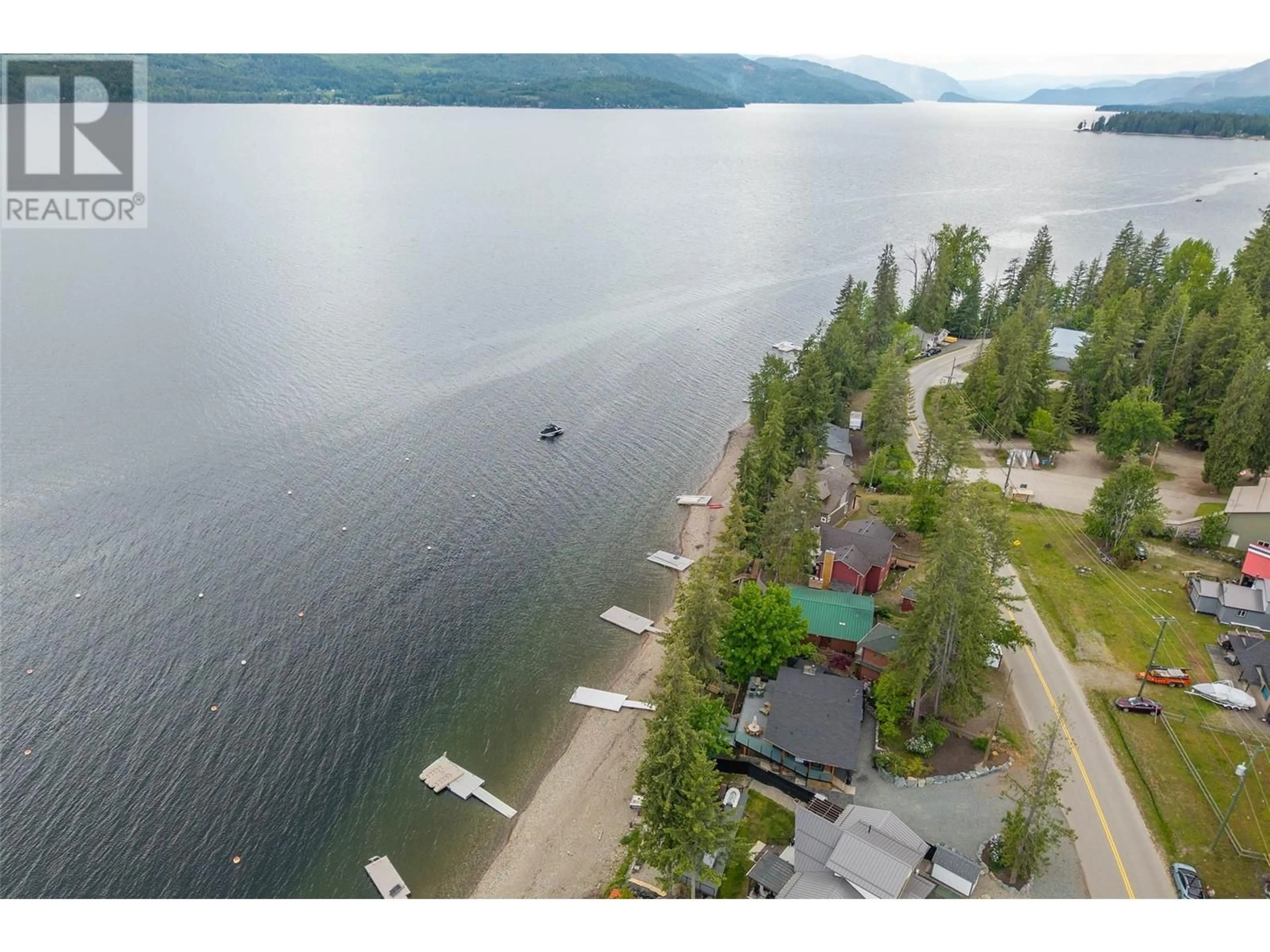 A pic from outside/outdoor area/front of a property/back of a property/a pic from drone, water/lake/river/ocean view for 7720 SQUILAX ANGLEMONT ROAD, North Shuswap British Columbia V0E1M8